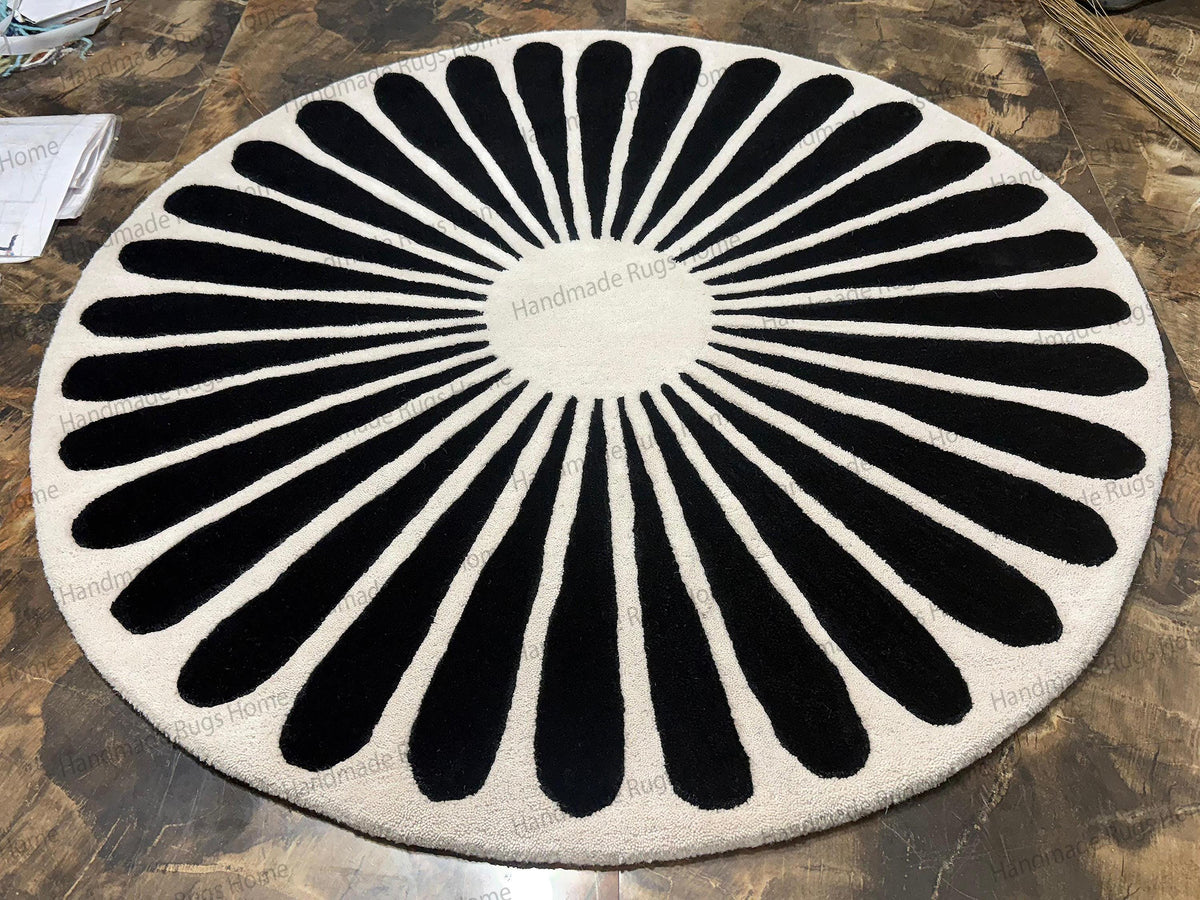 Luxury circle rug with geometric radial design for living room.