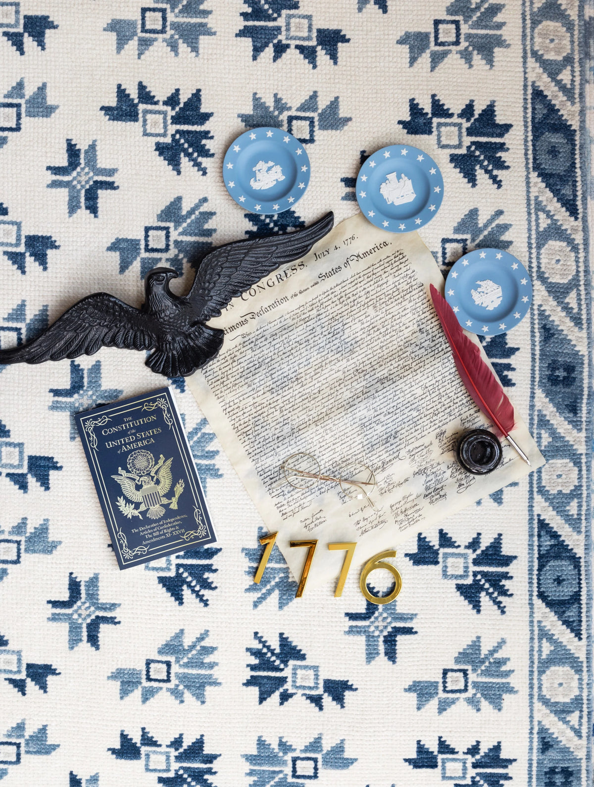 Medium blue and ivory Modern Oushak area rug with repeating floral geometric motifs and decorative border