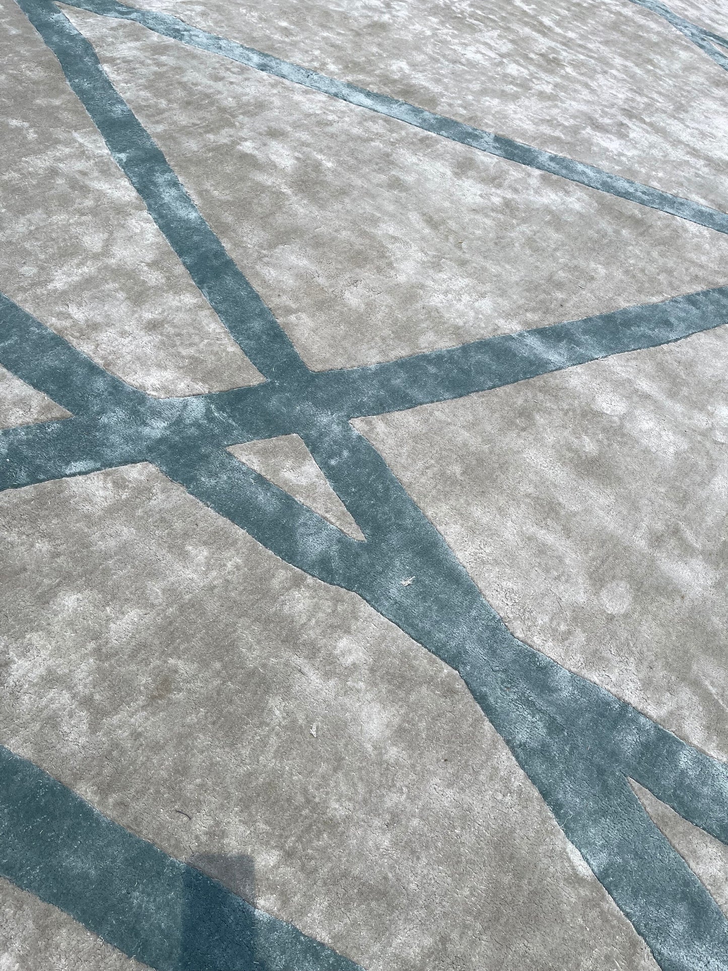 Luxurious hand-tufted rug with colorful modern patterns and soft textures.