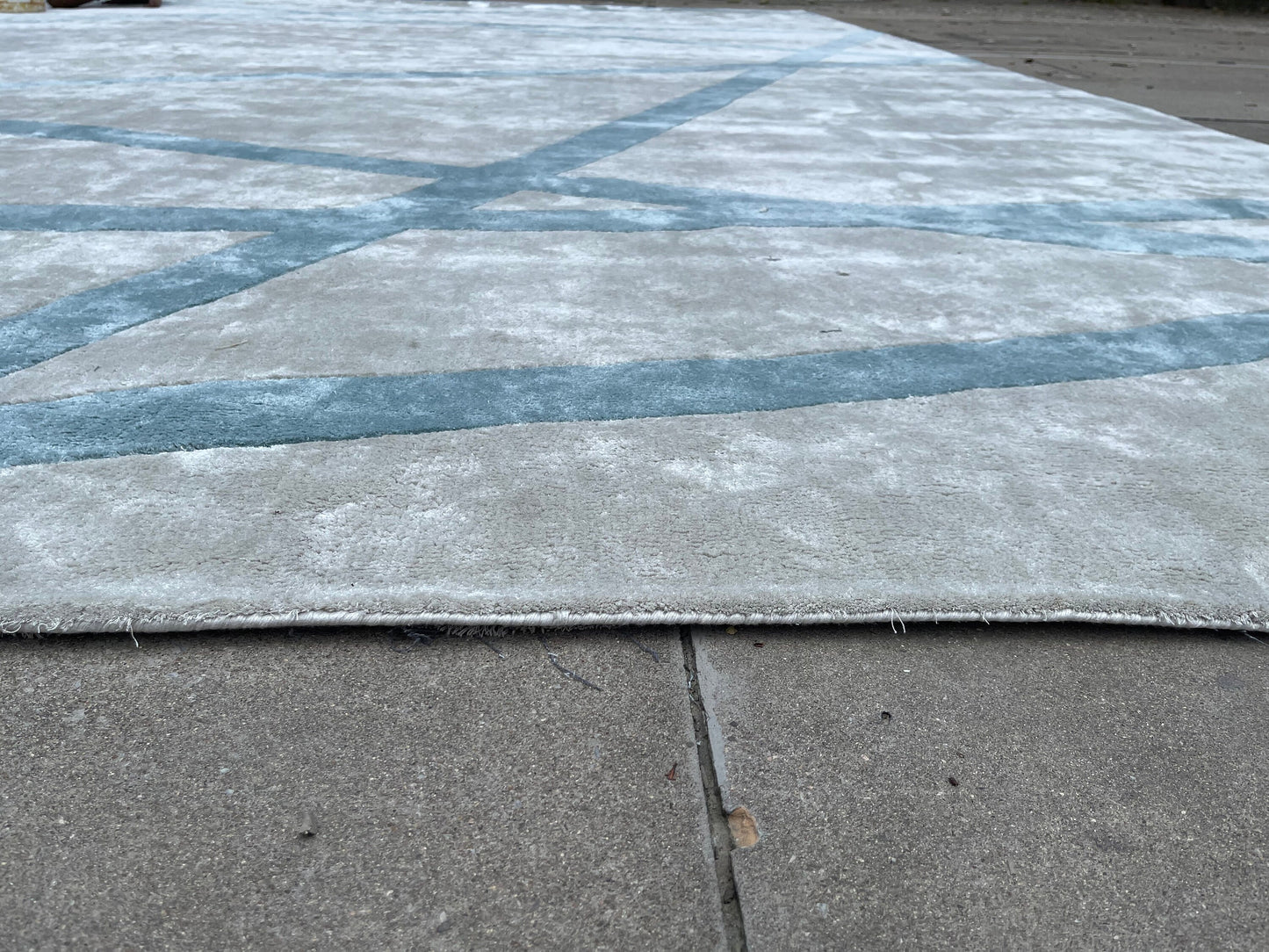 Handmade colorful rug with a trendy, hand-tufted modern design.
