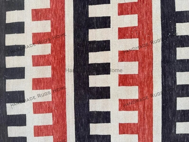 Eye-catching striped rug with bold red and beige tones, ideal for modern interiors.