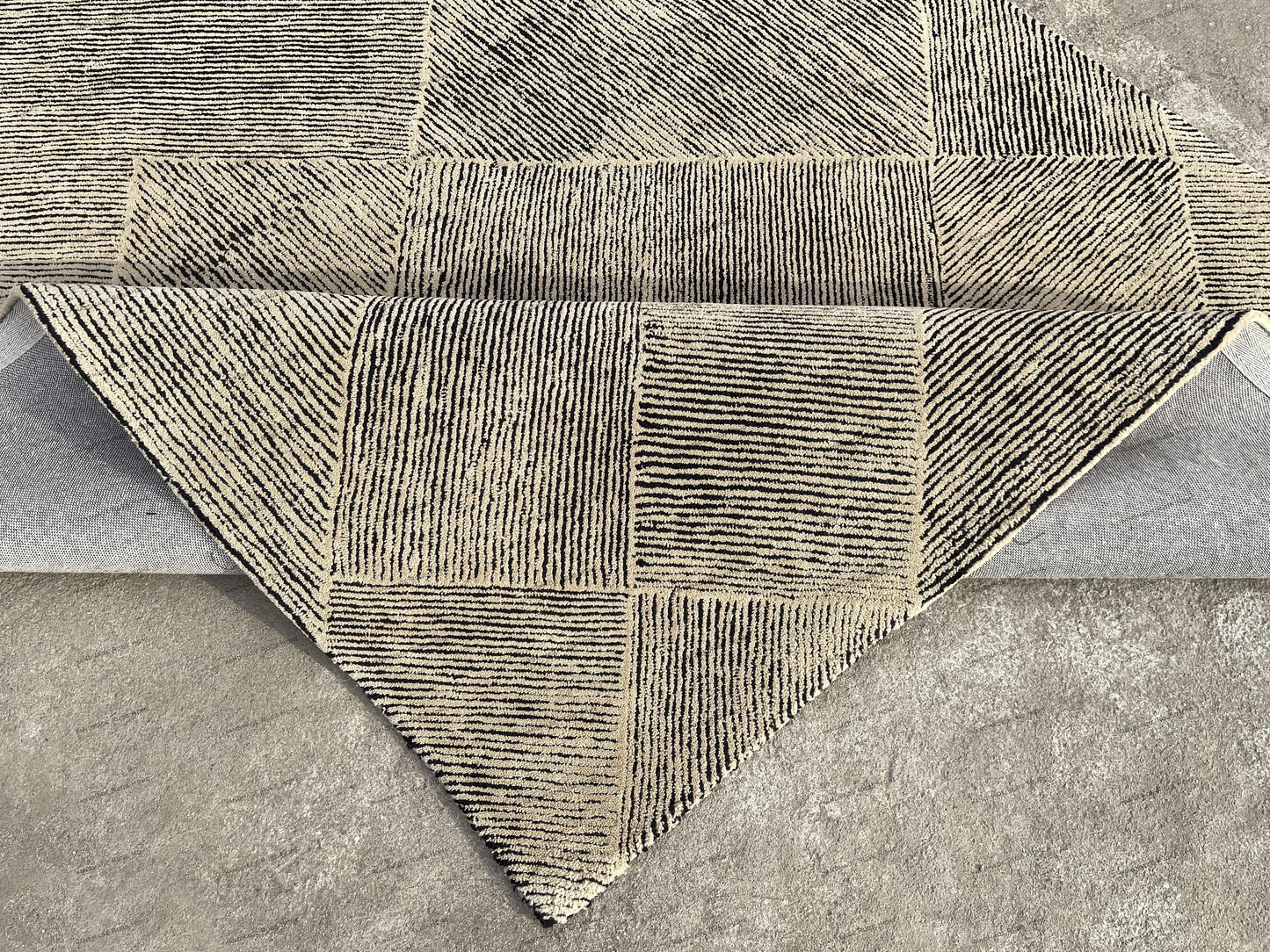 Handmade colorful rug with a trendy, hand-tufted modern design.