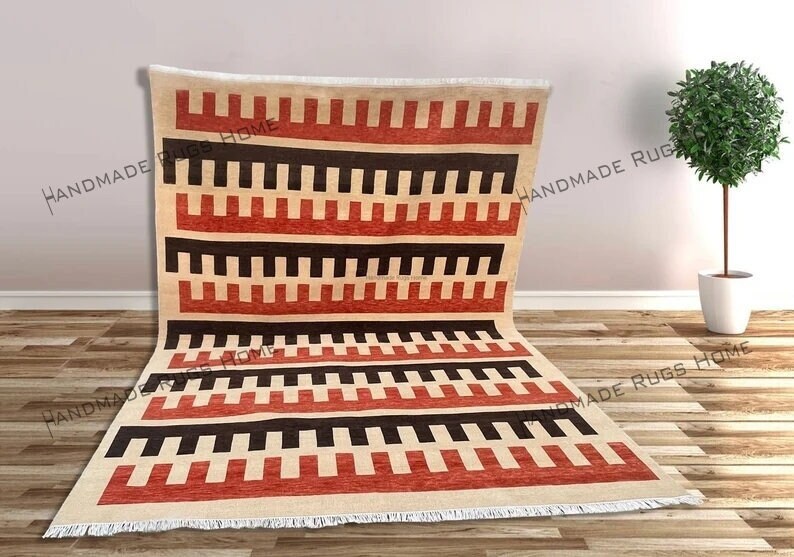 Warm and bold geometric area rug, perfect for enhancing living room décor.