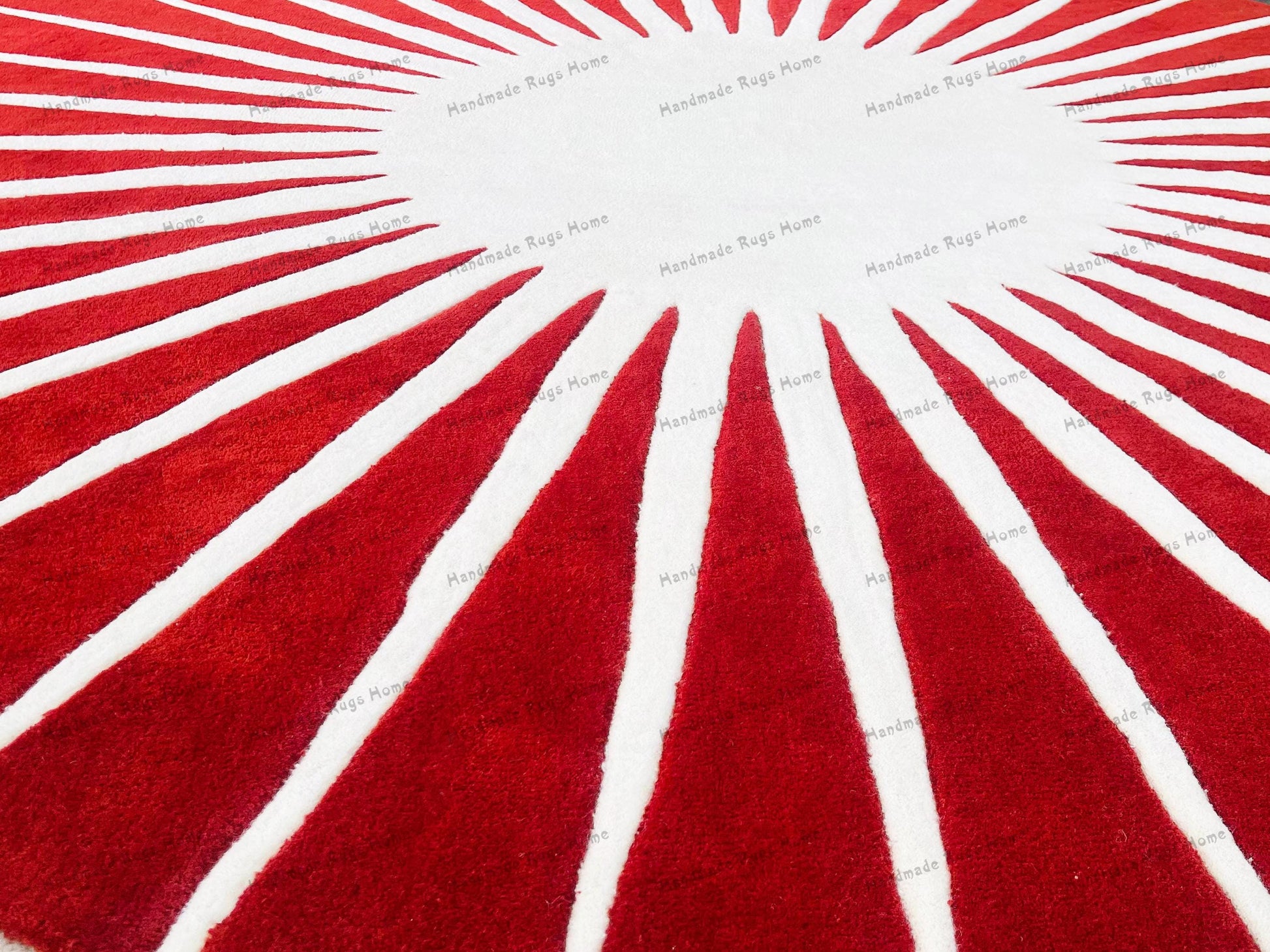Handmade round rug featuring red stripes