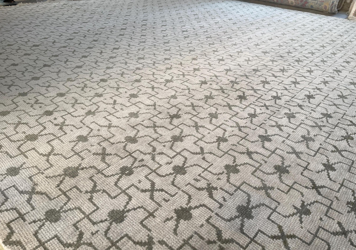 Beautiful Oushak rug in warm terracotta and ivory tones.