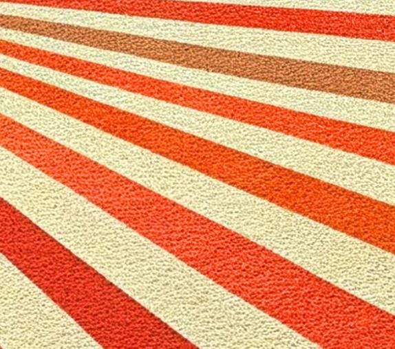 Hand-Tufted Wool Round Rug: Vibrant Sunburst Design