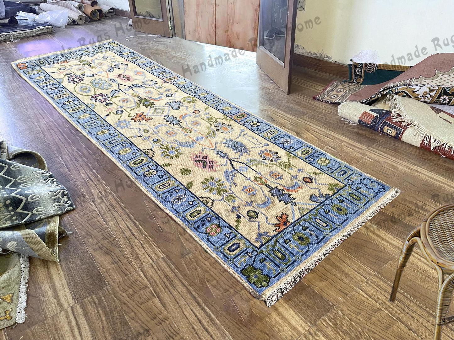 Elegant Oushak handmade runner rug showcasing stunning geometric patterns in soft, muted colors. Crafted from high-quality wool, this durable rug is perfect for hallways or entryways, adding warmth and charm to your home decor.