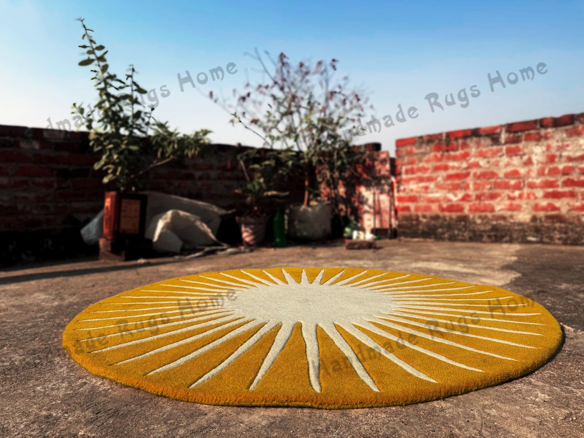 Round tufted rug in a rich mustard color, designed to resemble the sun with radiating textured patterns. The soft, plush surface adds warmth and a bold focal point to any room.