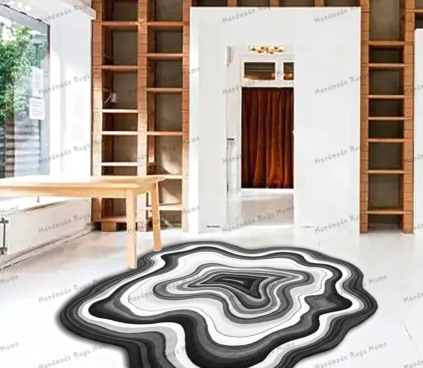 Chic round hand-tufted rug with a wavy texture, adding a playful yet sophisticated element to your home decor. Great for any modern interior.