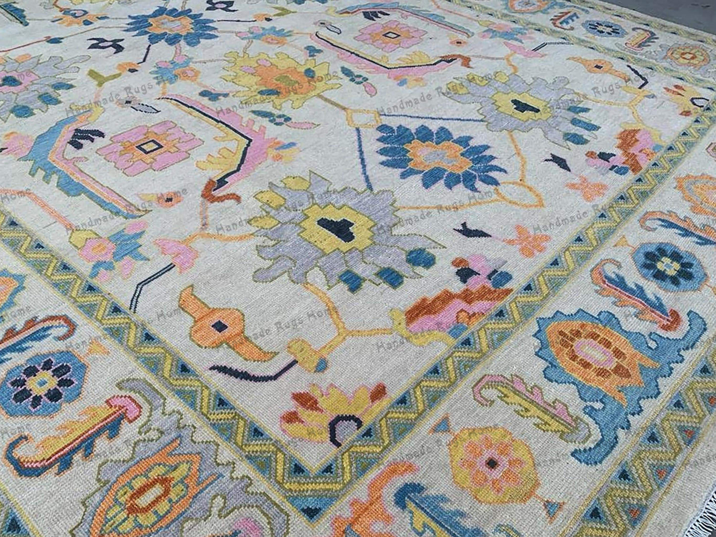 Beautiful pastel-colored Oushak rug for cozy spaces