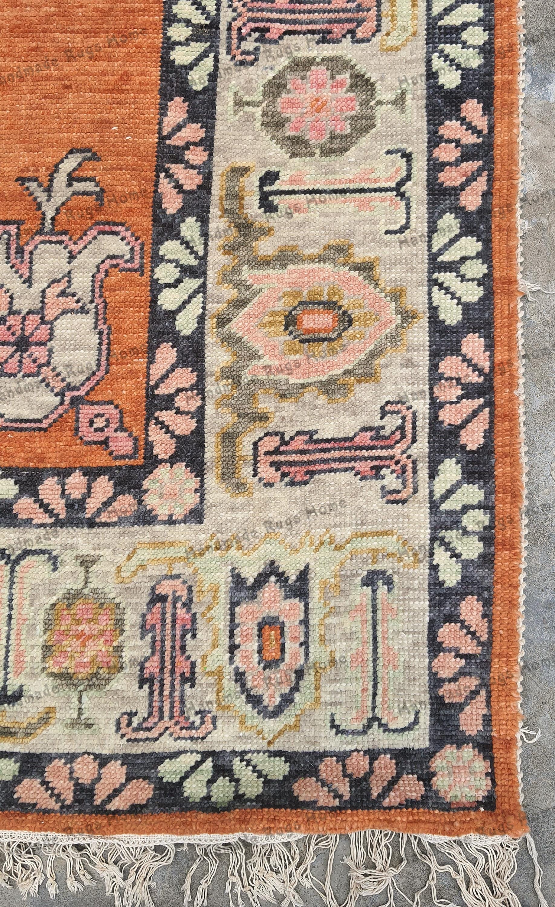 Burnt orange handwoven rug with fringe detailing