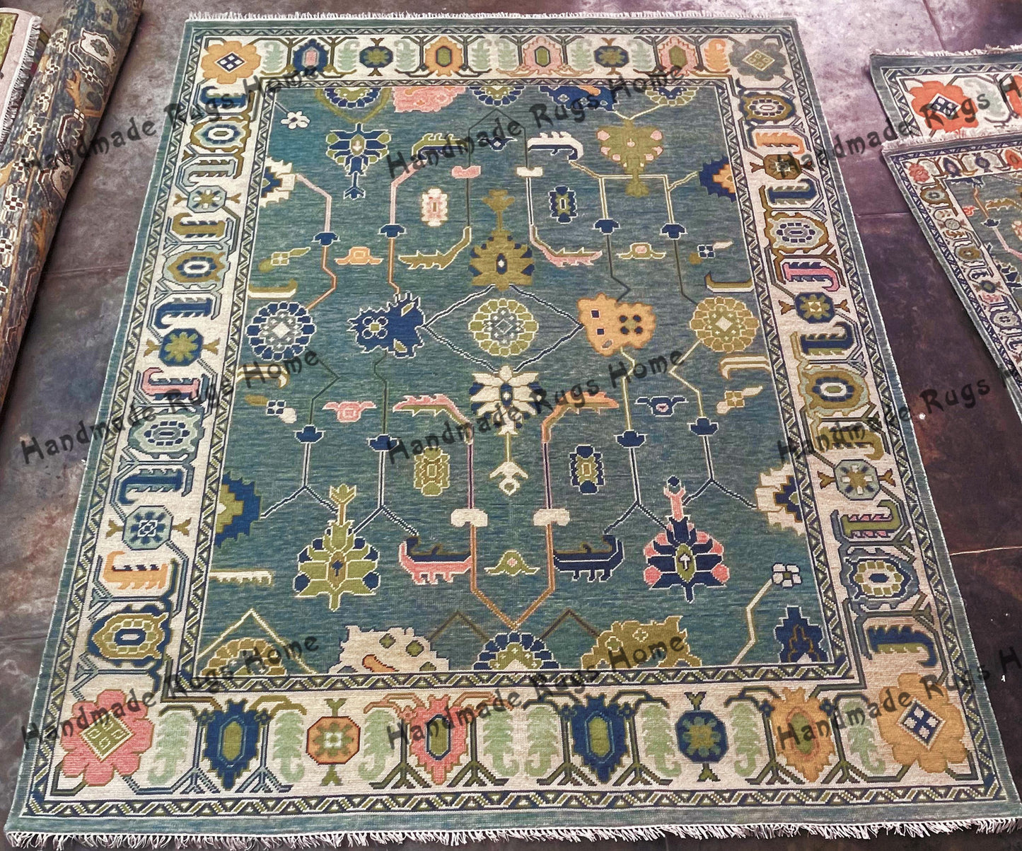 Luxurious vintage-style handmade wool rug in blue tones.