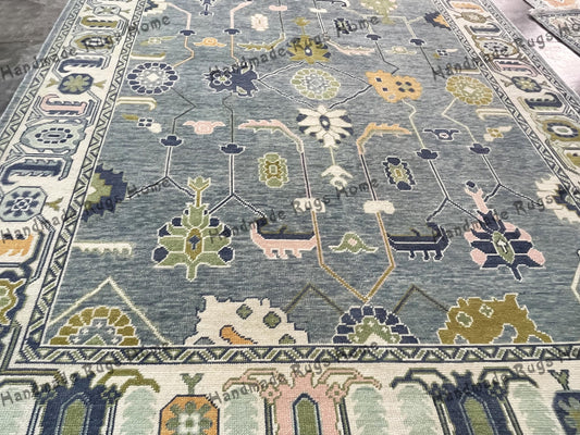 Handmade woolen rug with antique Turkish patterns.