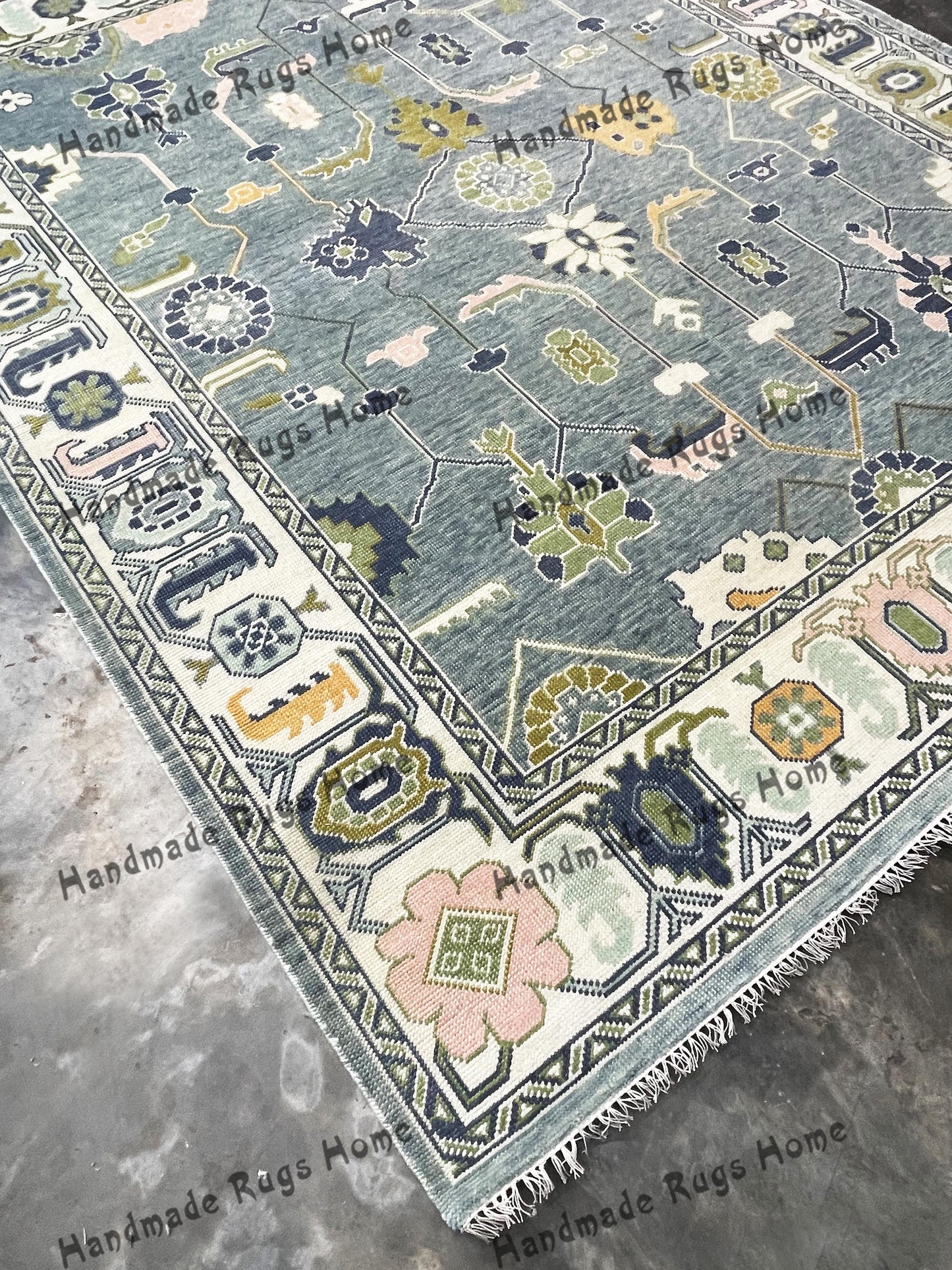 Designer hand-knotted Oushak rug with vintage charm.