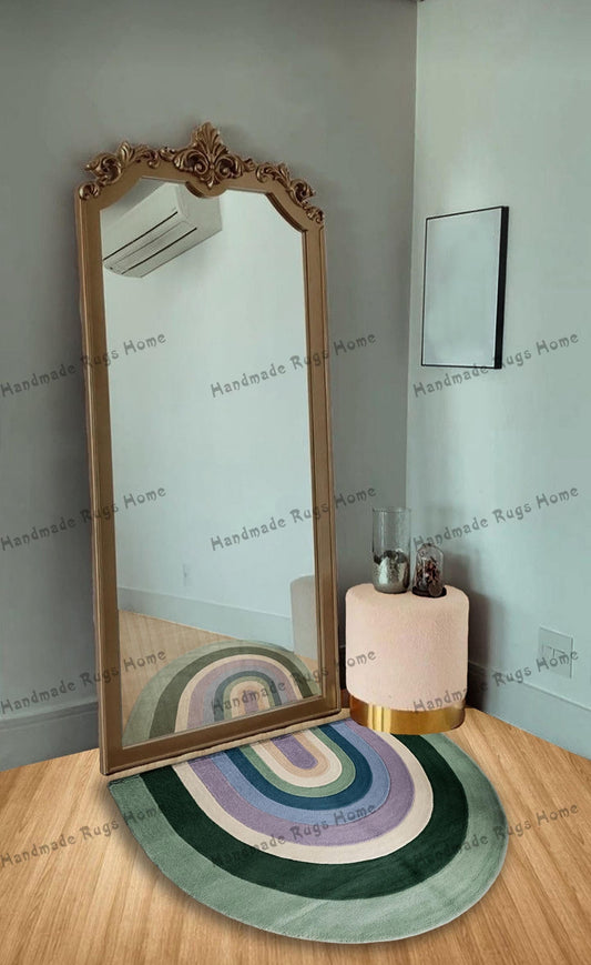 Handmade tufted green and colorful modern rug with vibrant abstract patterns. Perfect for adding a contemporary and unique touch to any room in your home.