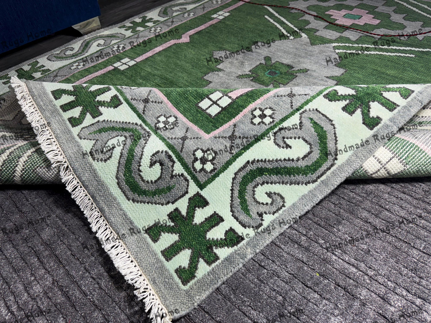 Beautiful handwoven Turkish rug with geometric motifs and ethnic patterns.