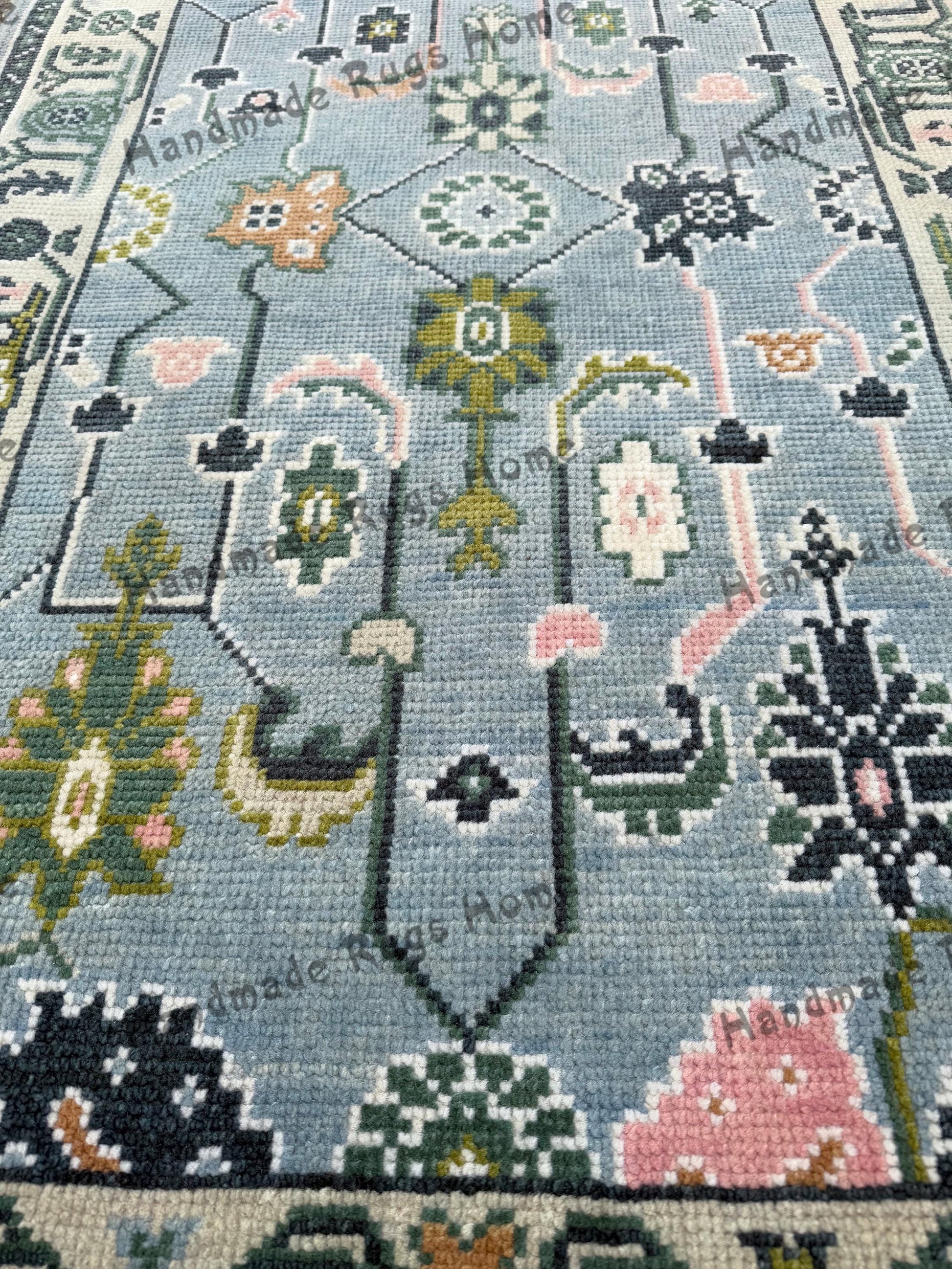Vibrant handmade Oushak rug, featuring traditional Turkish patterns, ideal for gifting or home décor.