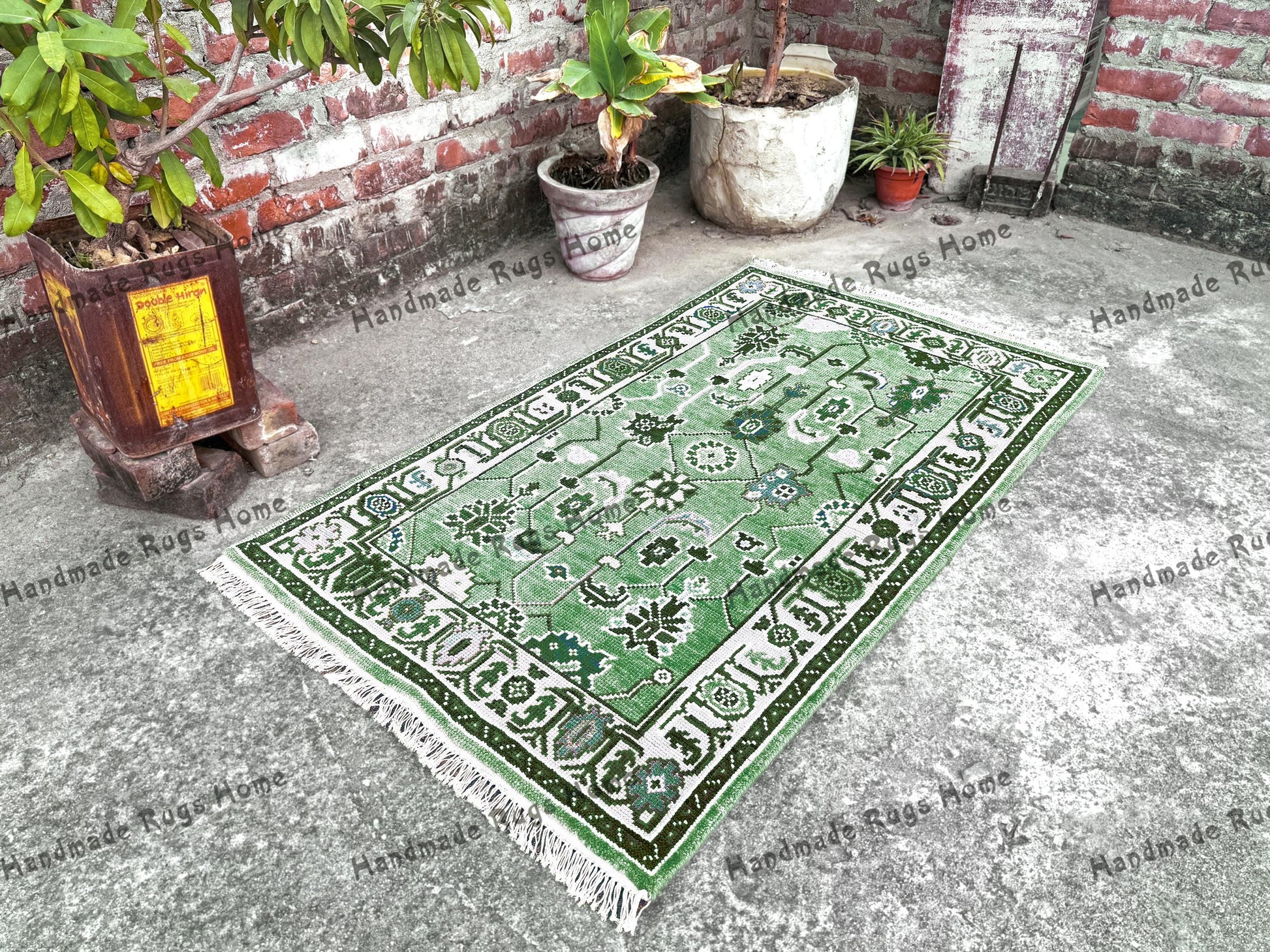 Beautiful handcrafted Oushak rug in teal and pink, perfect for living rooms or bedrooms.