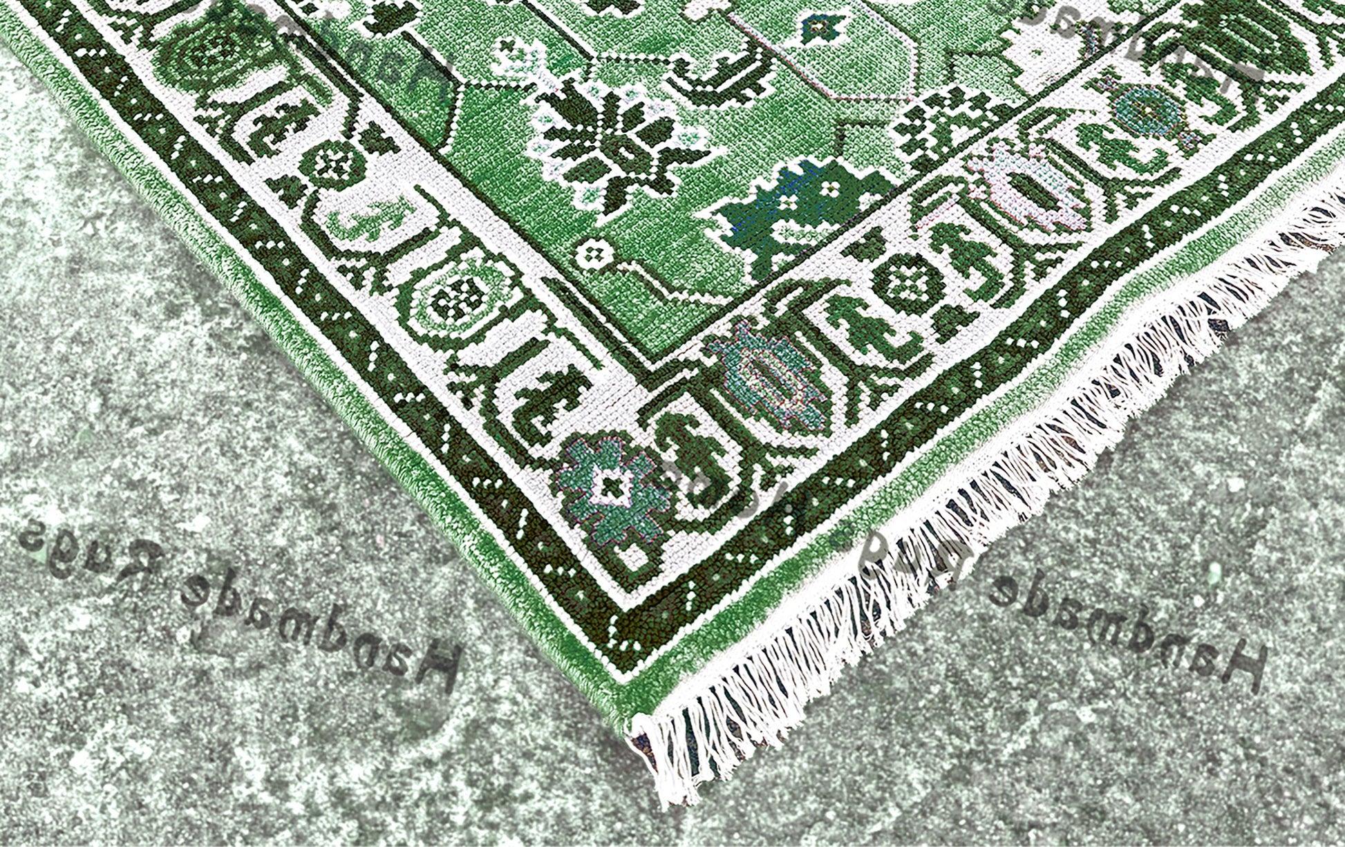 Turquoise and green Oushak-style rug featuring detailed floral and vine designs.