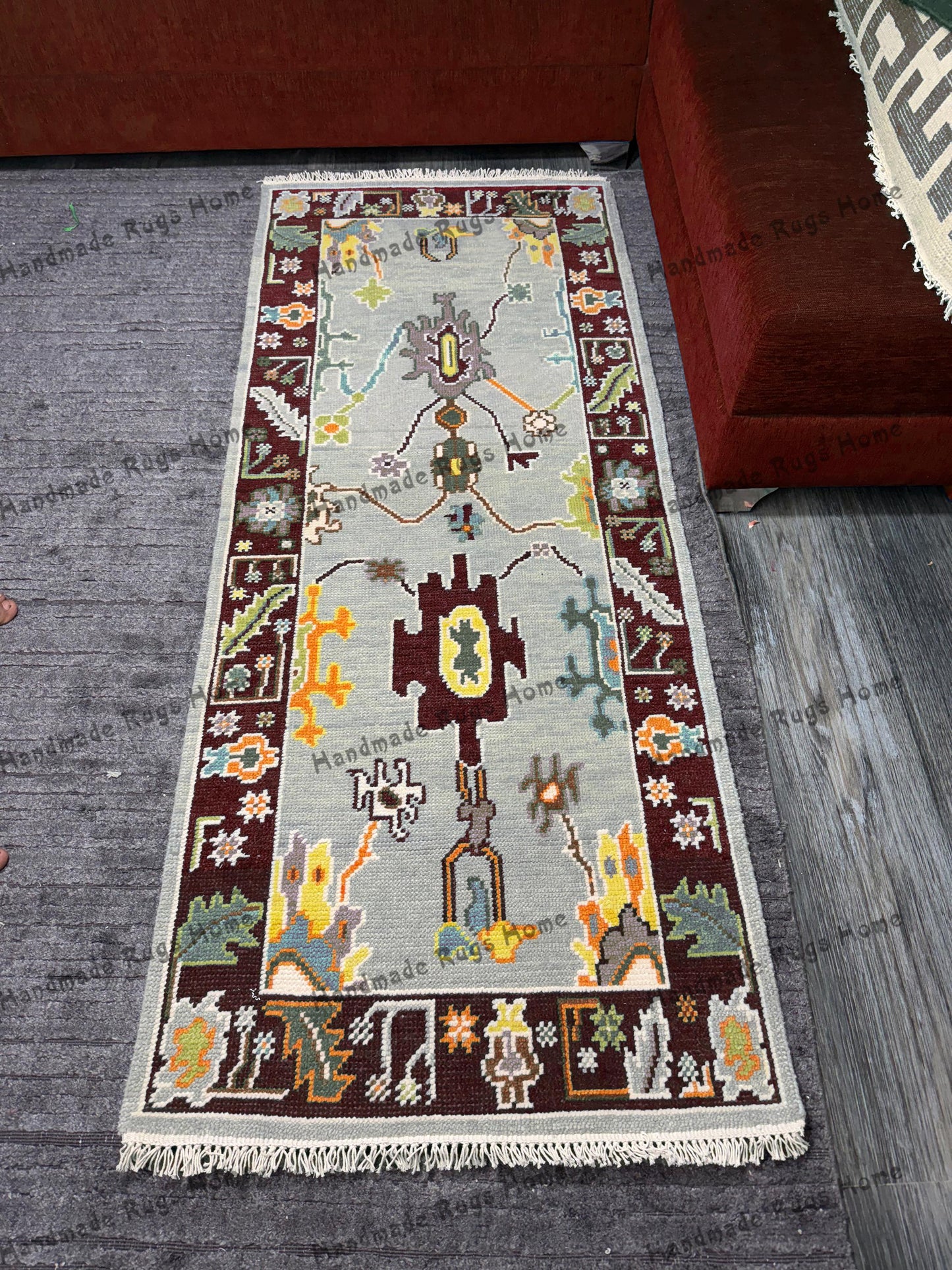 Elegant Turkish runner rug with traditional motifs and wool material.