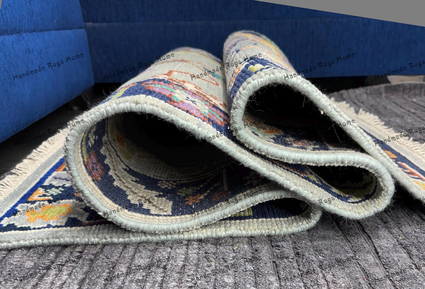 Turkish Oushak rug in blue and pastel tones for classic home decor.
