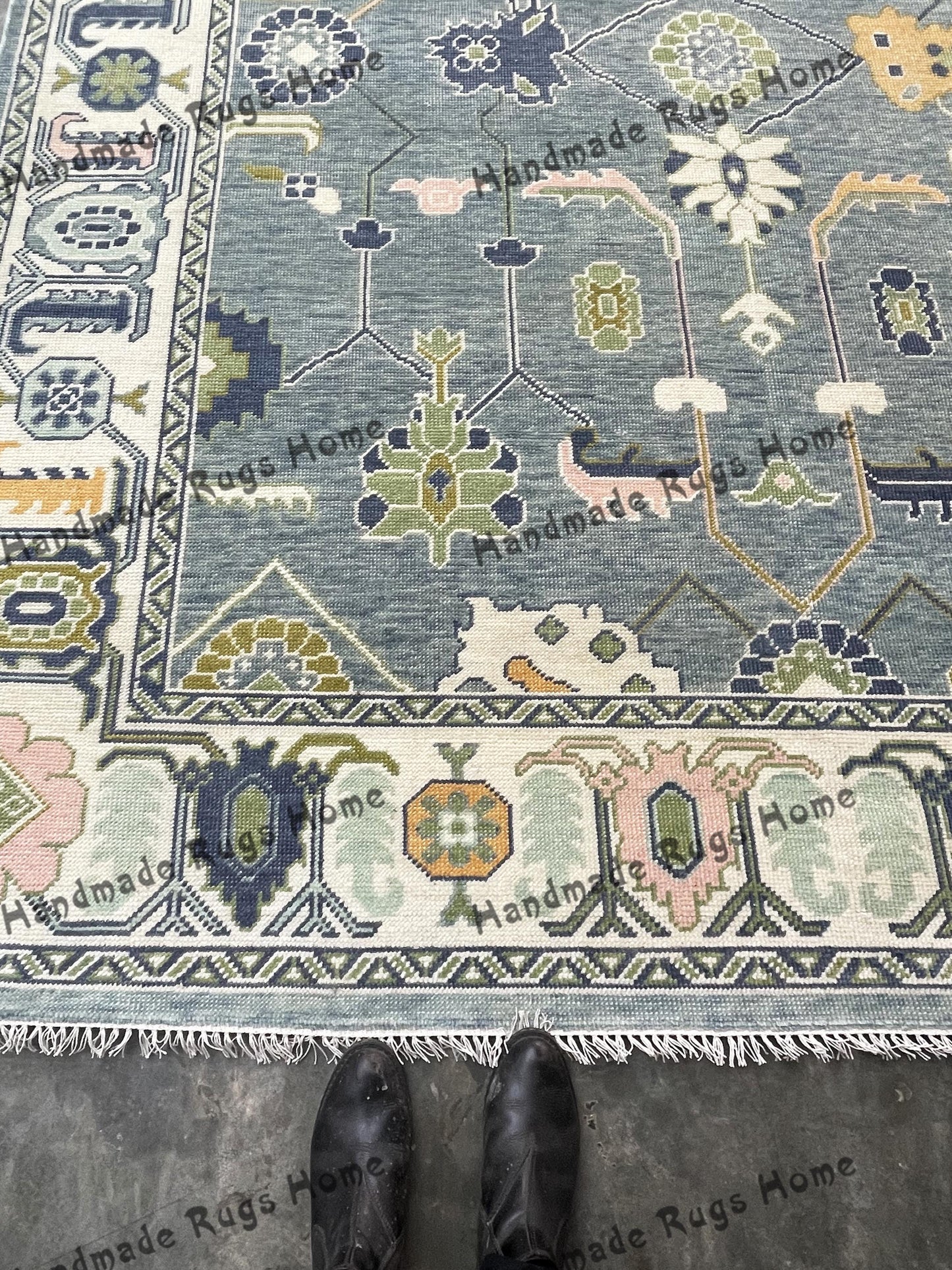 Traditional Oushak rug featuring intricate craftsmanship.