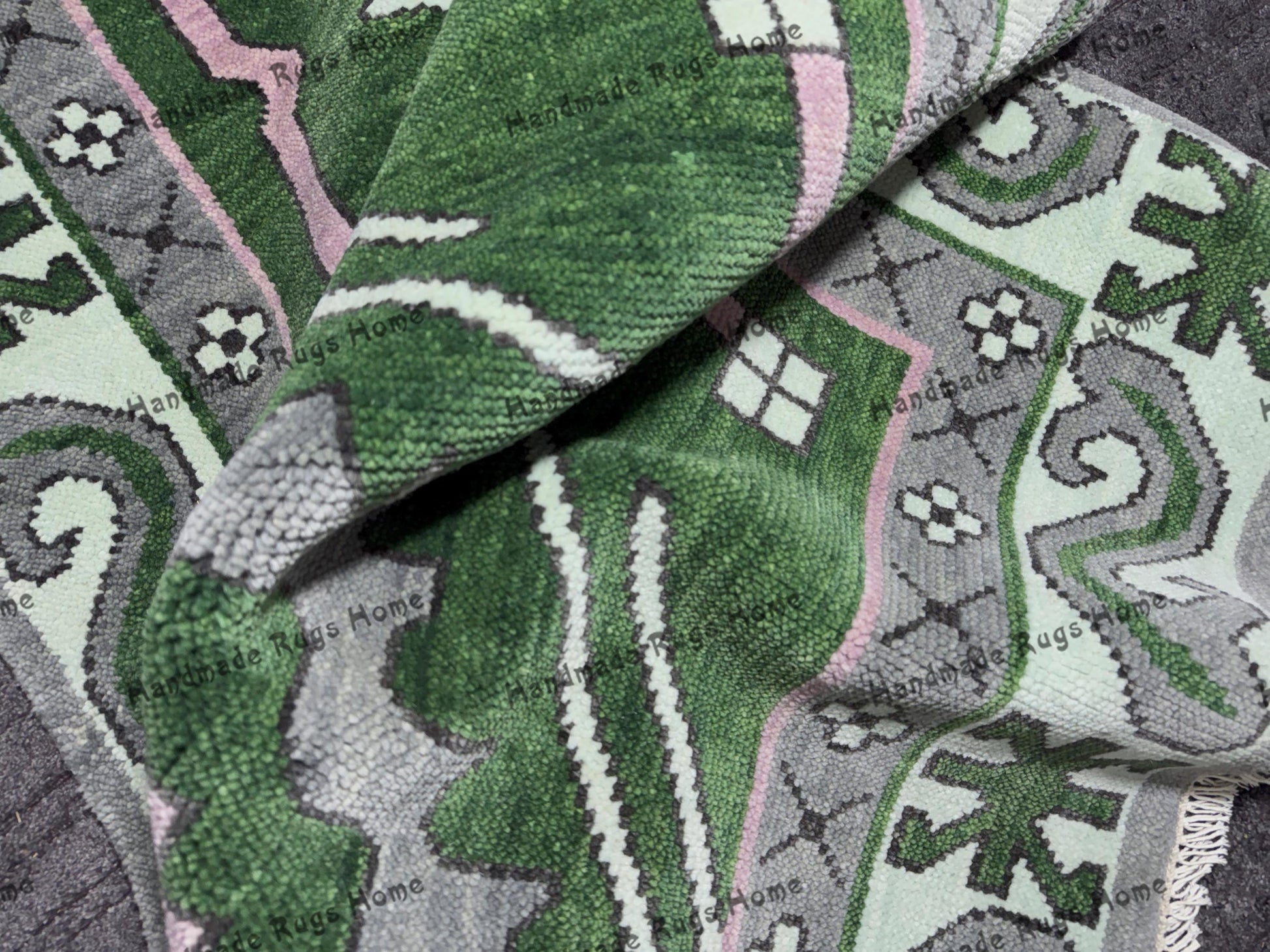 Close-up of a handmade vintage-style Oushak rug with intricate detailing.