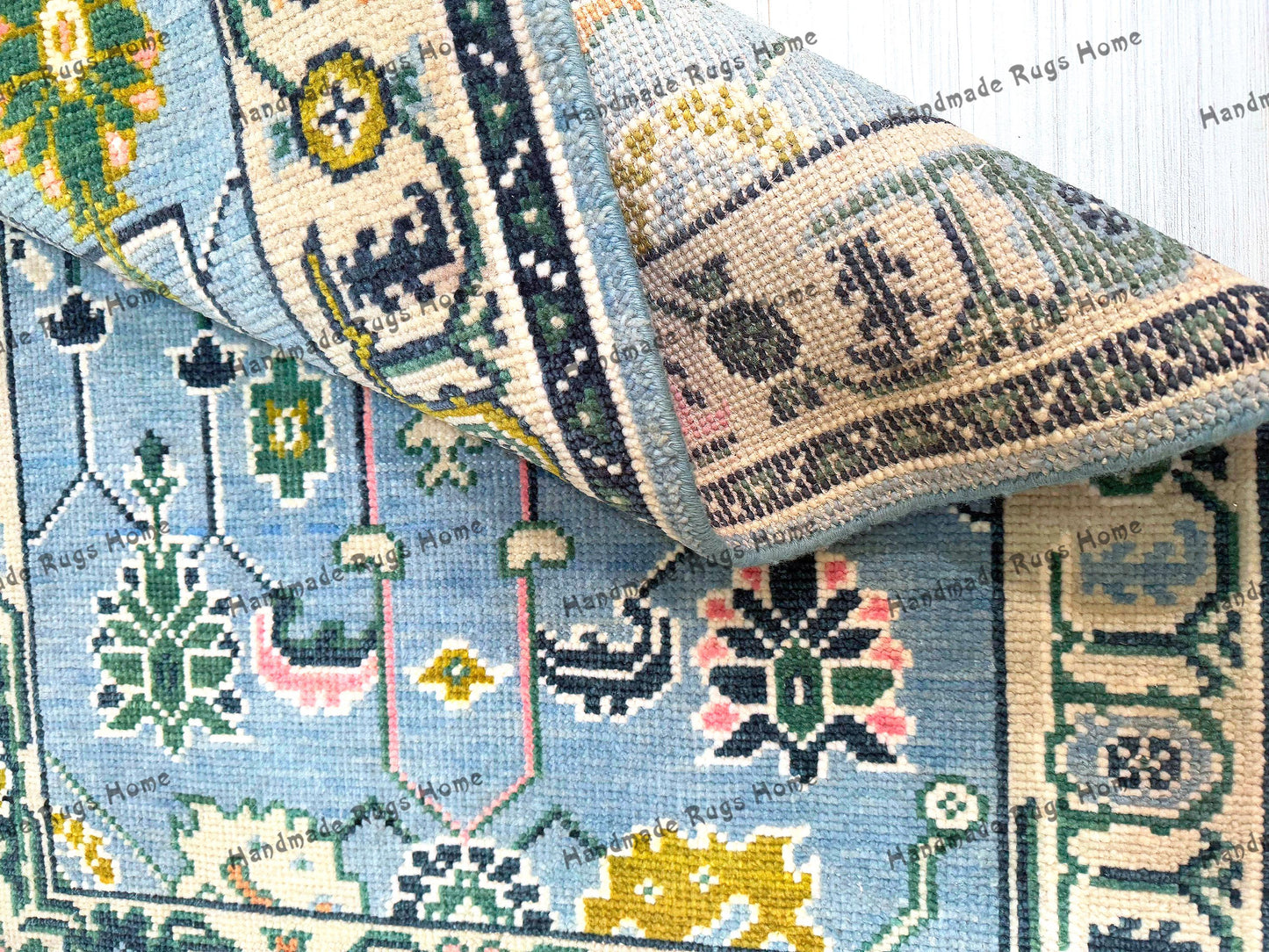 High-quality handwoven area rug with a timeless design.