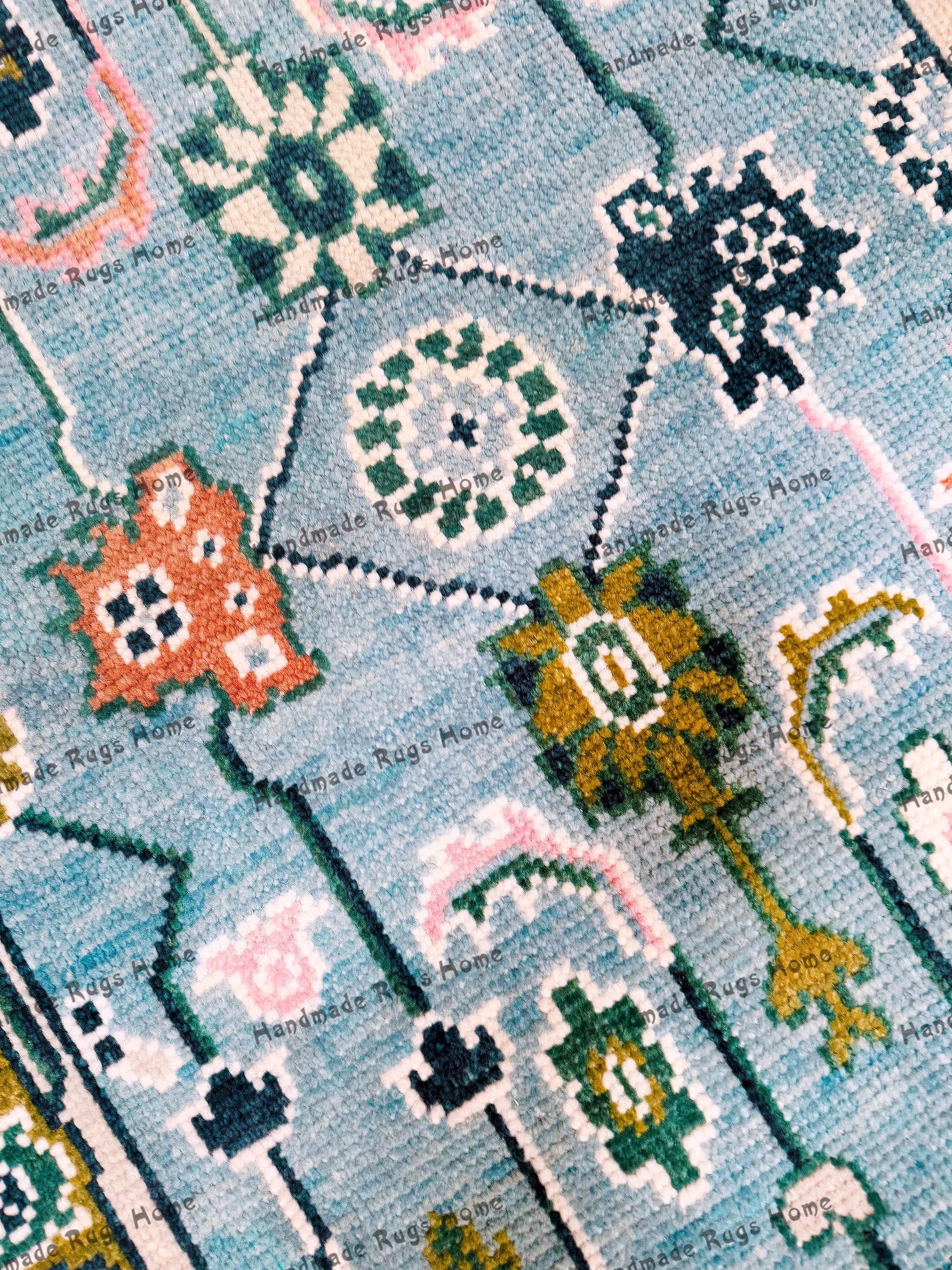 Close-up of a luxury handmade Oushak carpet with pastel tones.