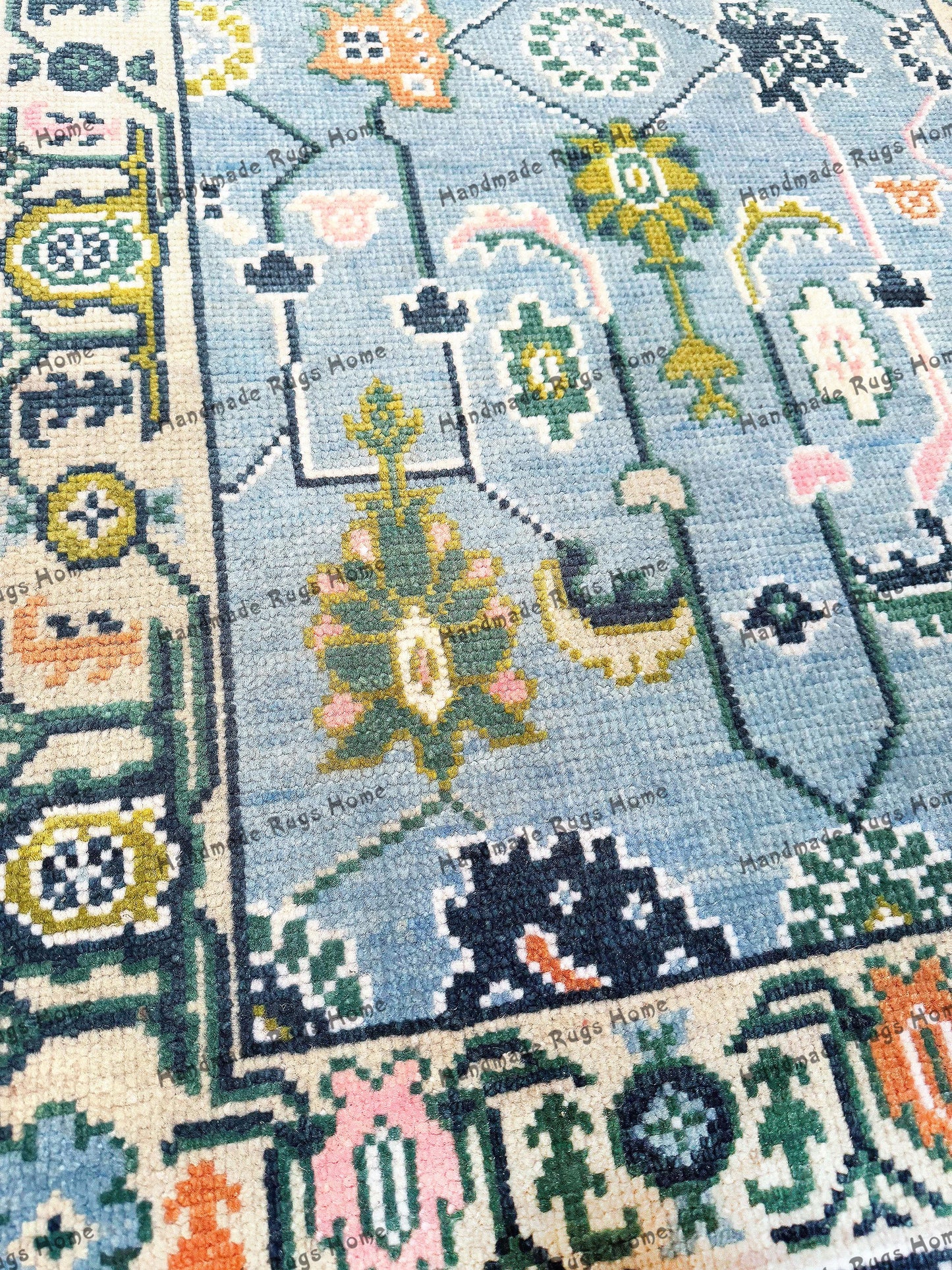 Elegant Persian-style blue rug for living room decor.