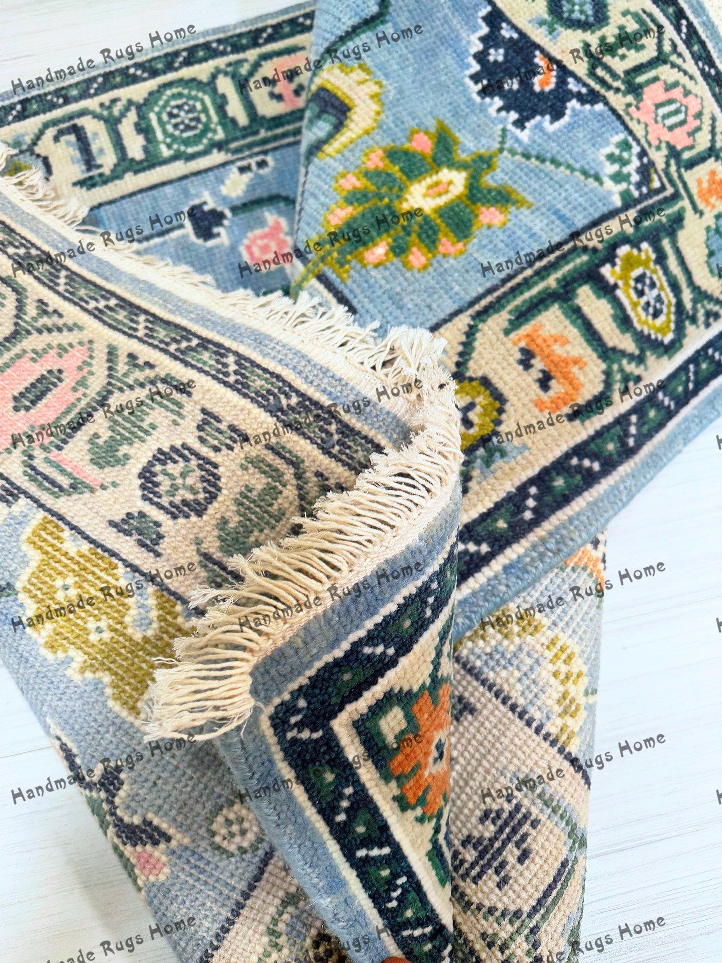 Soft wool Turkish rug in sky blue with vintage aesthetics.