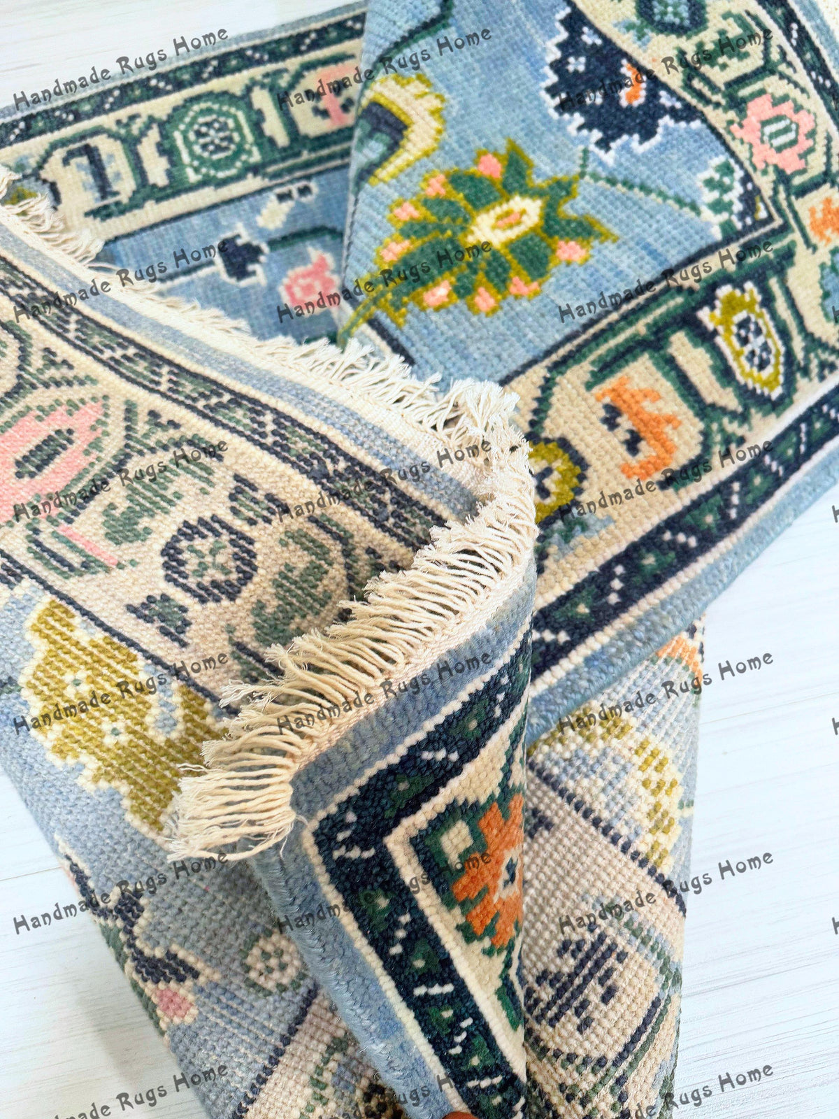Soft wool Turkish rug in sky blue with vintage aesthetics.