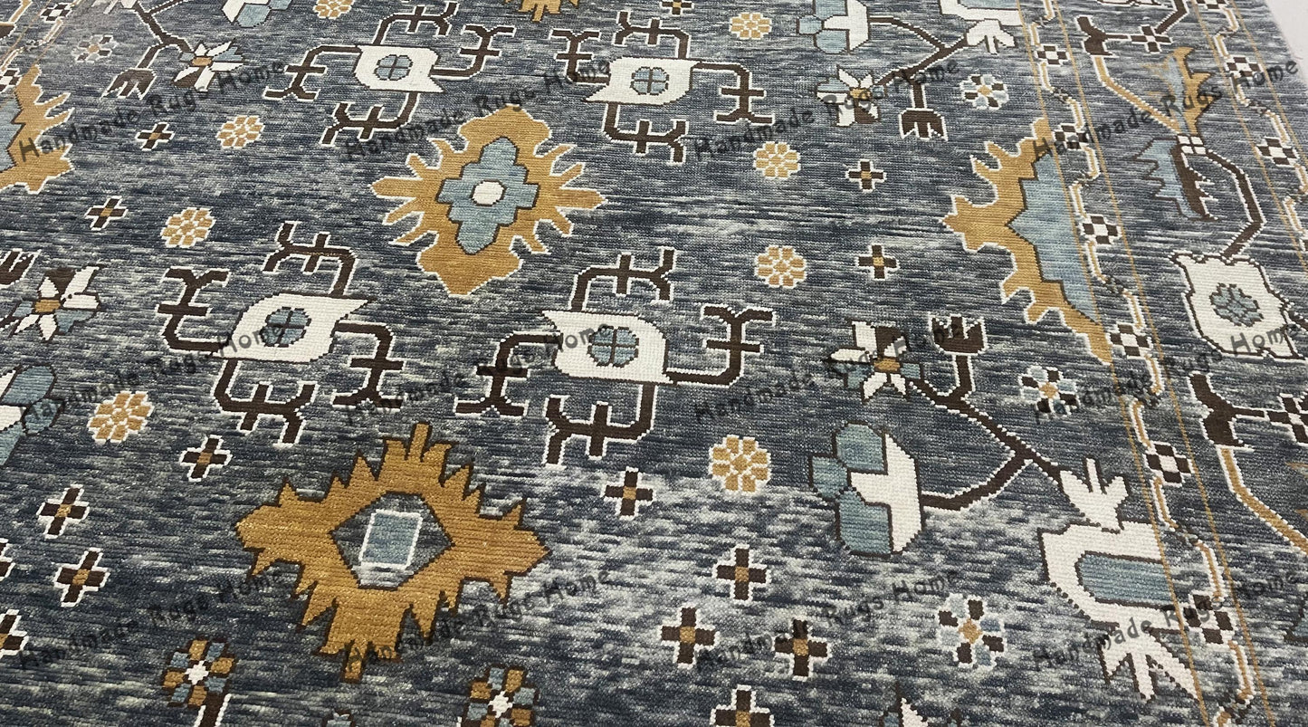 Traditional handmade carpet with a vintage tribal design.