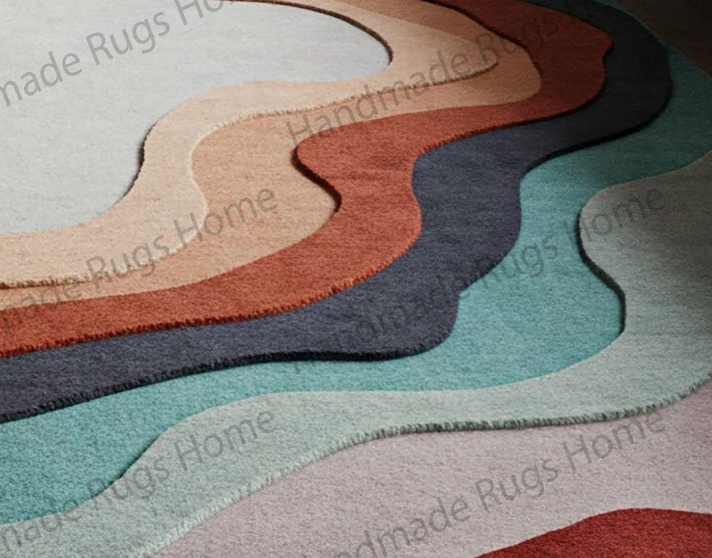 Artistic hand-tufted area rug with warm earthy tones