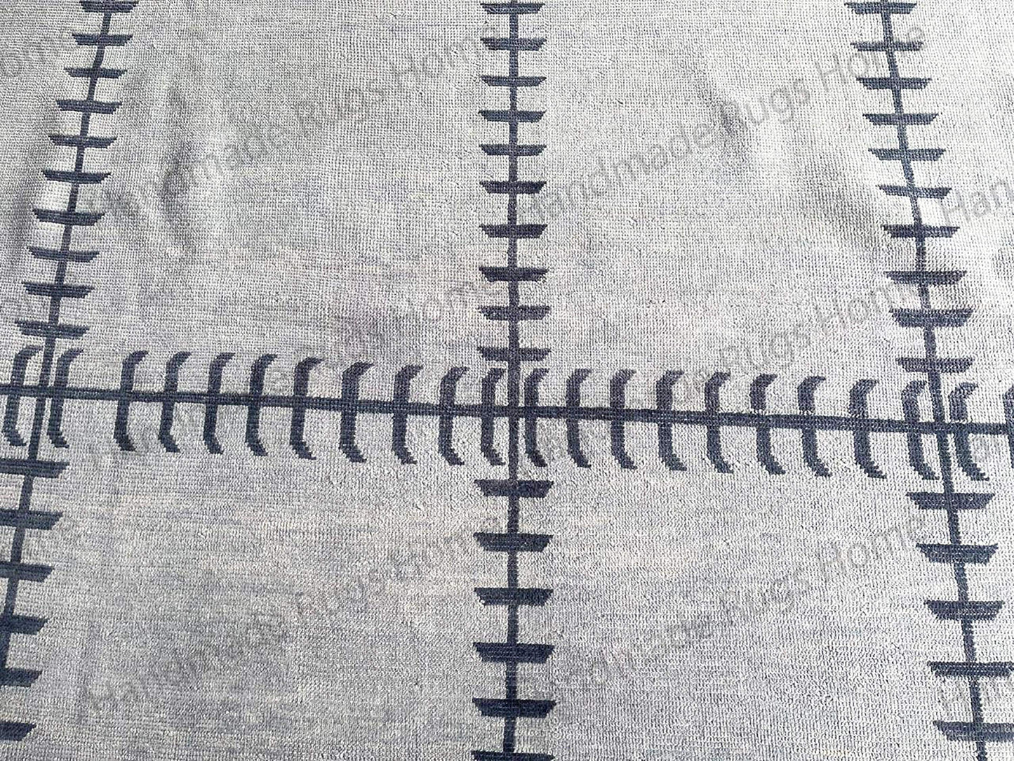 Large area rug with geometric lines and contemporary appeal