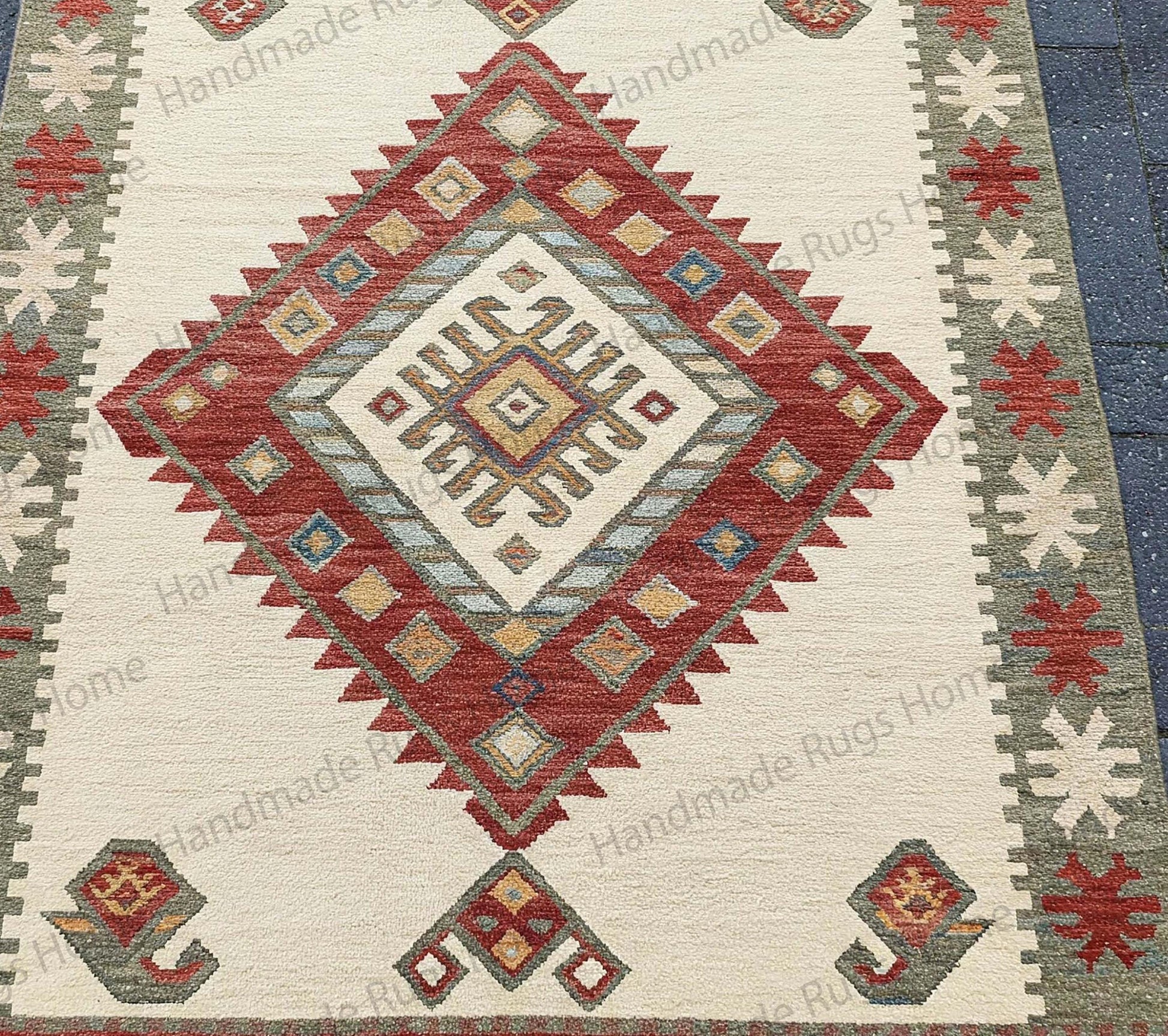 Traditional kilim-style flatweave rug with earthy tones