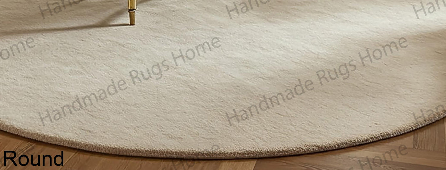 Cozy ivory wool rug on hardwood floor