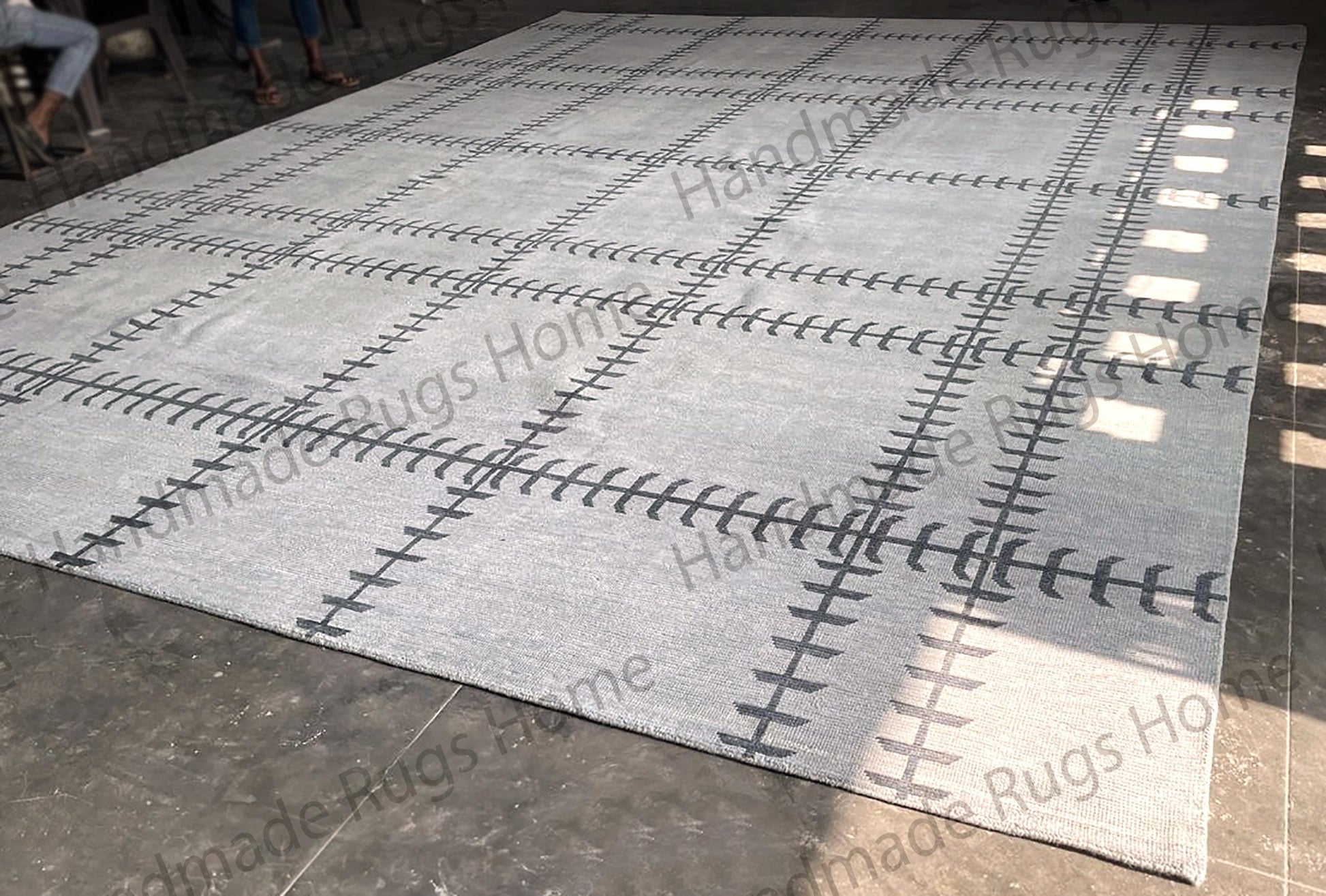 Handmade Oushak wool rug with modern geometric design