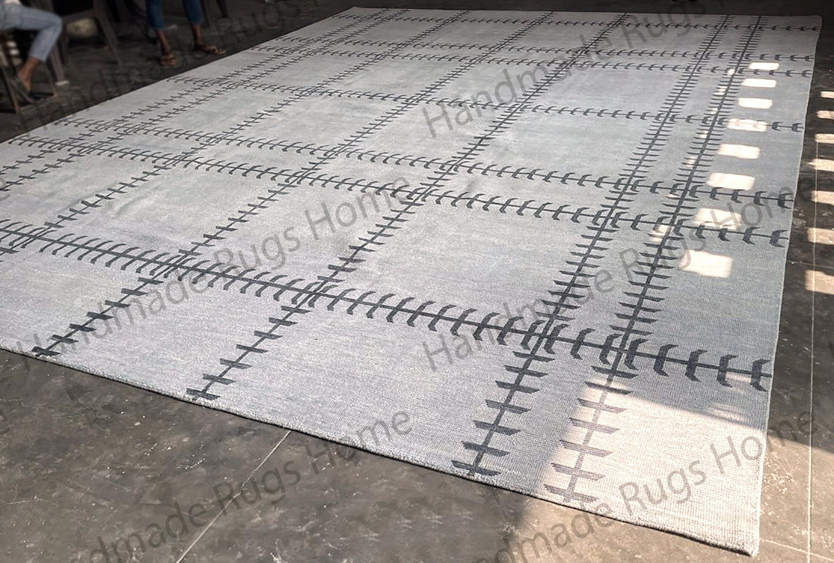 Handmade Oushak wool rug with modern geometric design