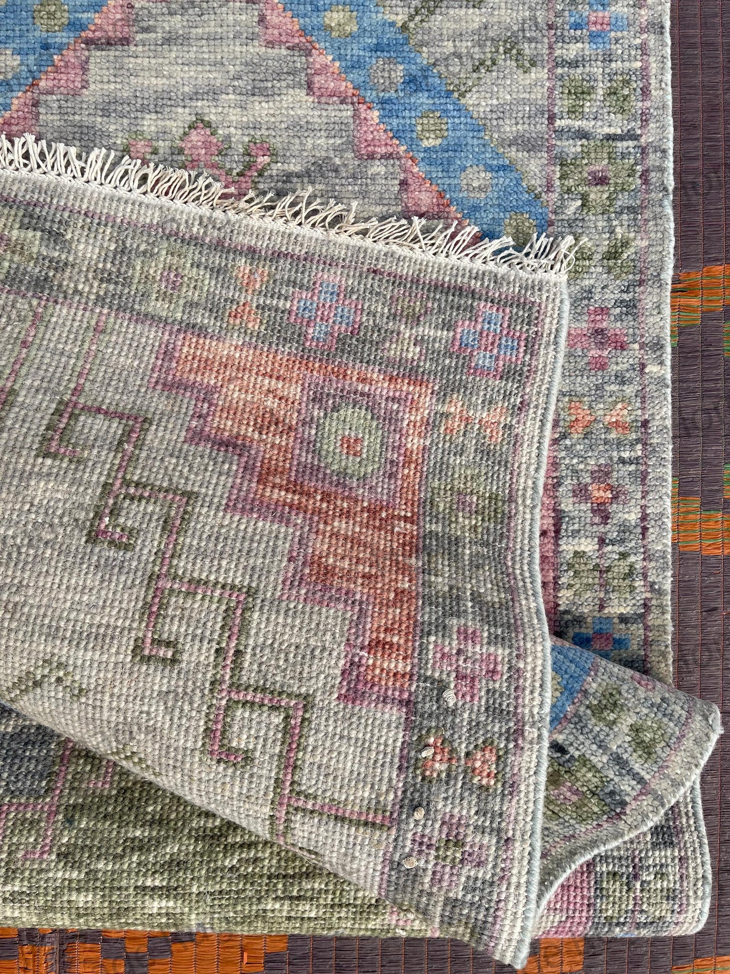High quality hand knotted wool rug.