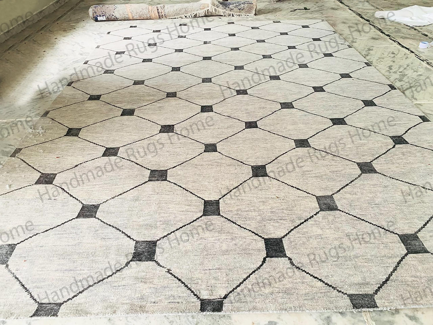 Handmade Oushak wool rug with a modern geometric pattern