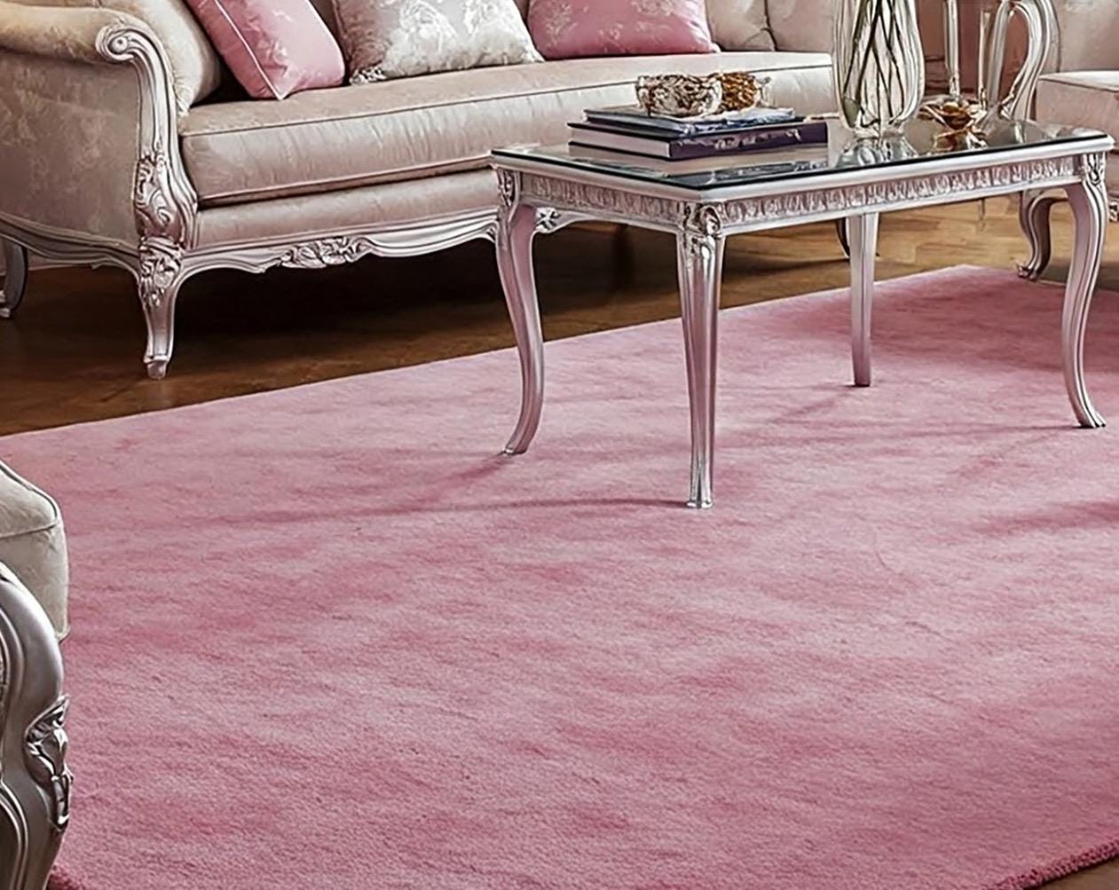 Cozy living room featuring soft pink tufted carpet