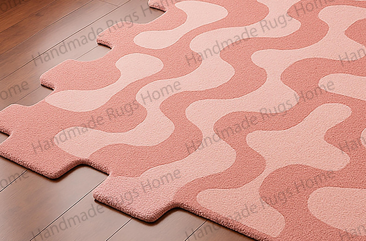 Pink and magenta wool rug on wooden floor