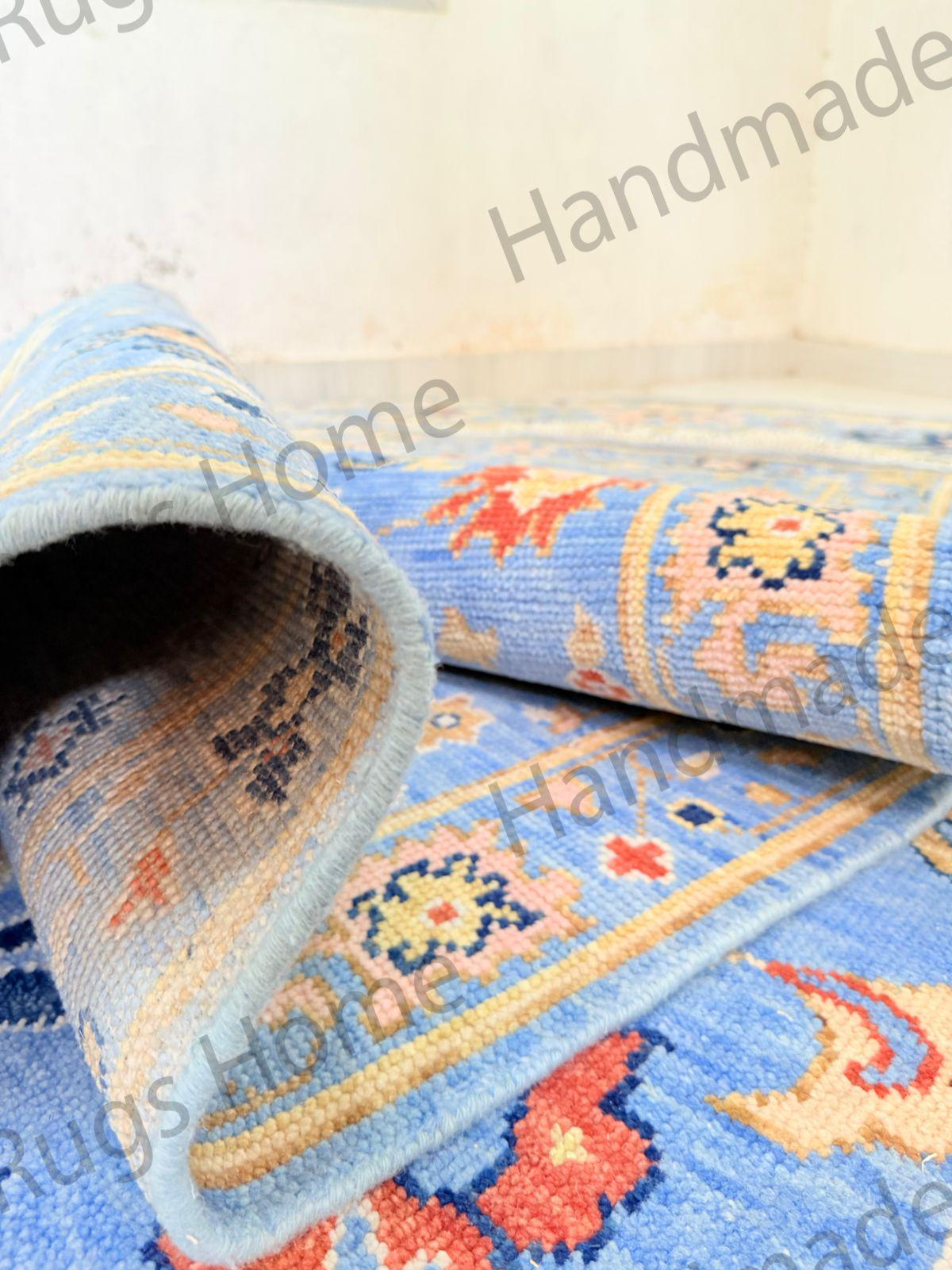 Traditional high-quality wool rug in sky blue and pastel tones