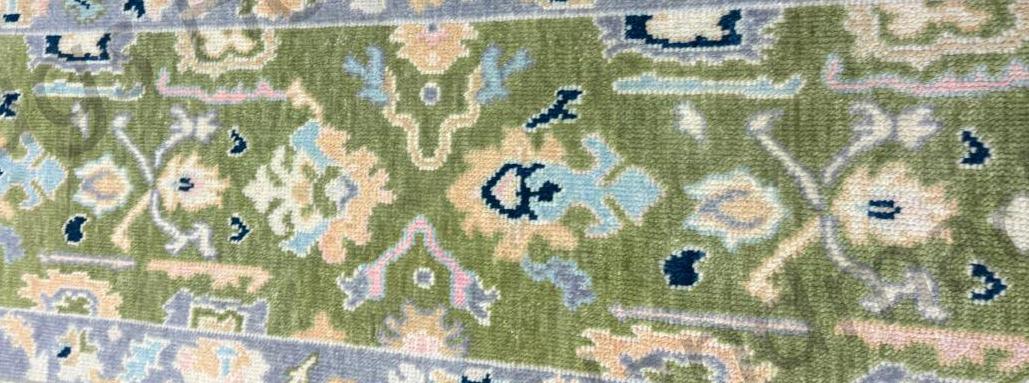 Lilac and green area rug, runner size.