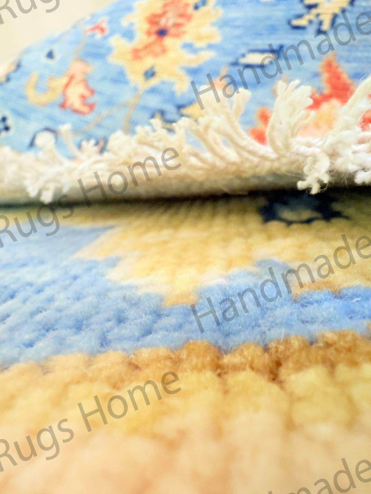 Blue Persian-style area rug with multicolor accents