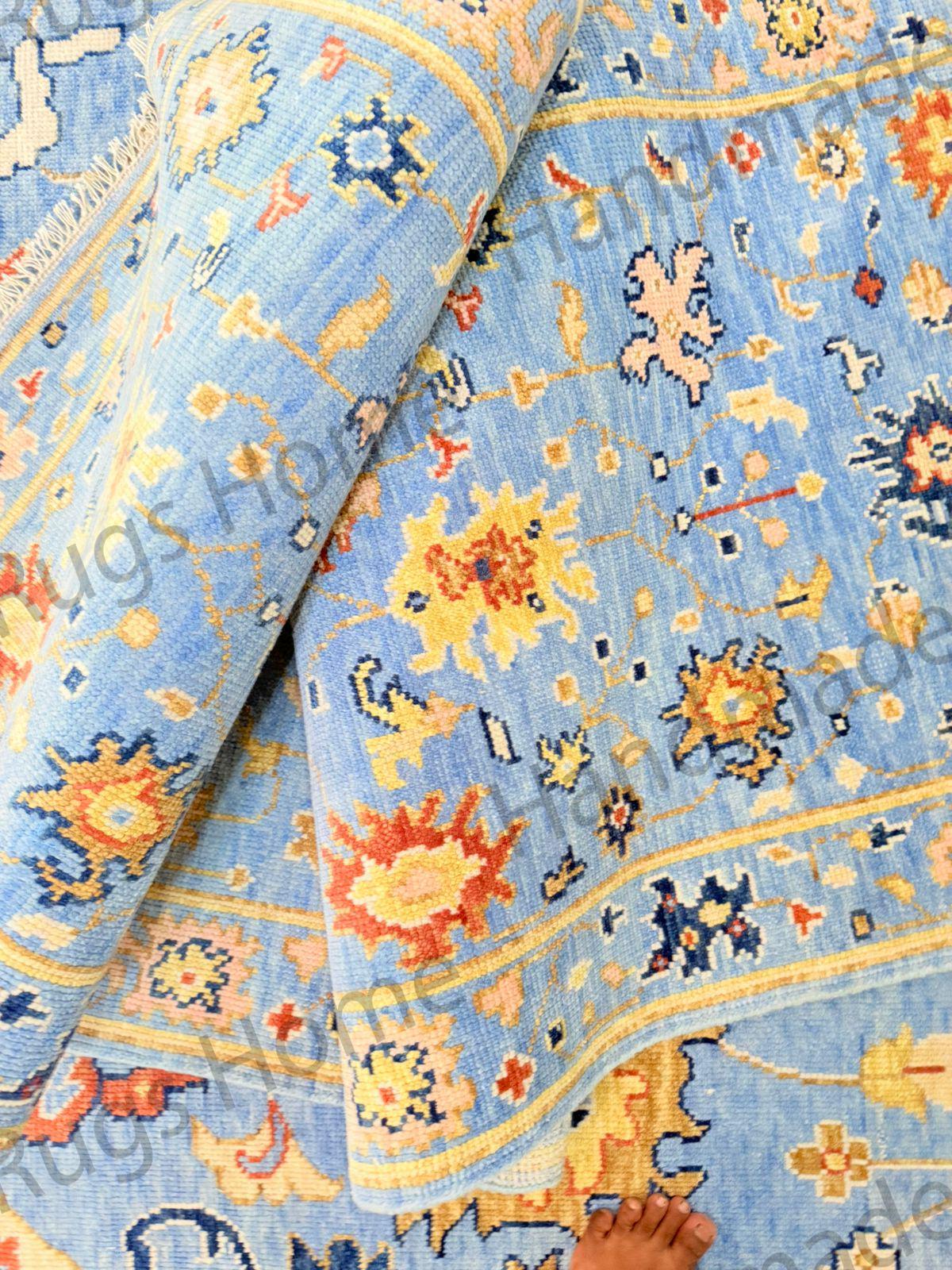 Elegant artisan rug with symmetrical floral pattern
