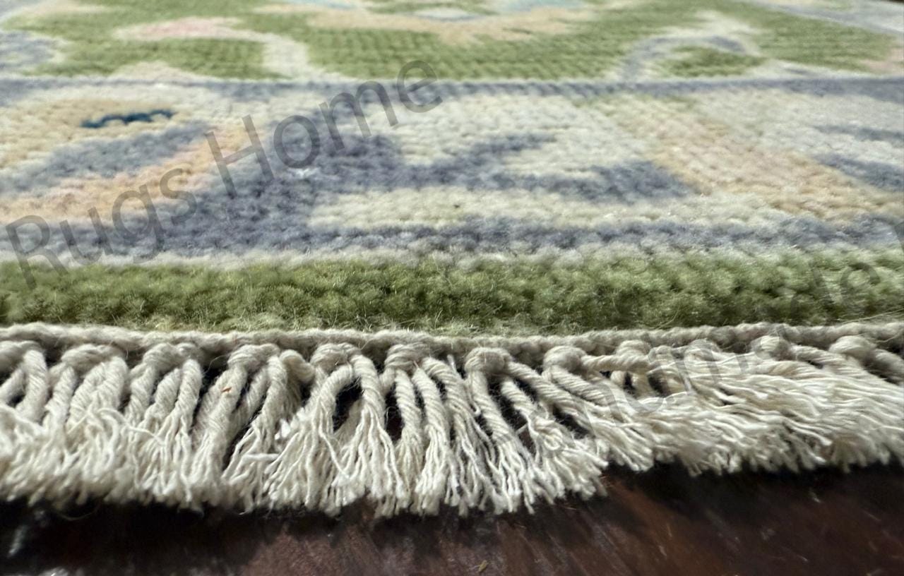 Vintage style green Oushak runner.