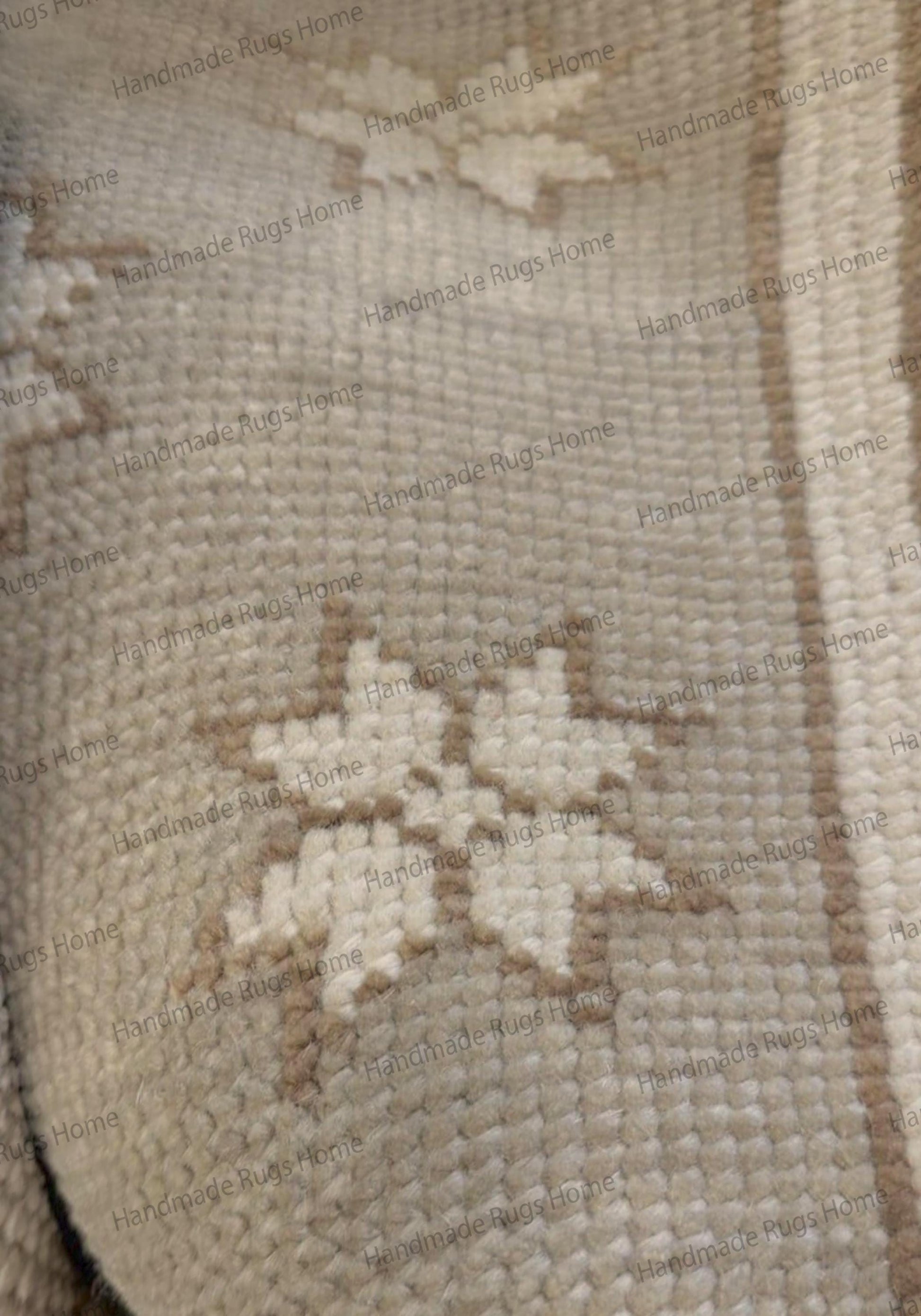 Detailed view of the tight knotting and low pile texture of a handmade star-patterned rug.