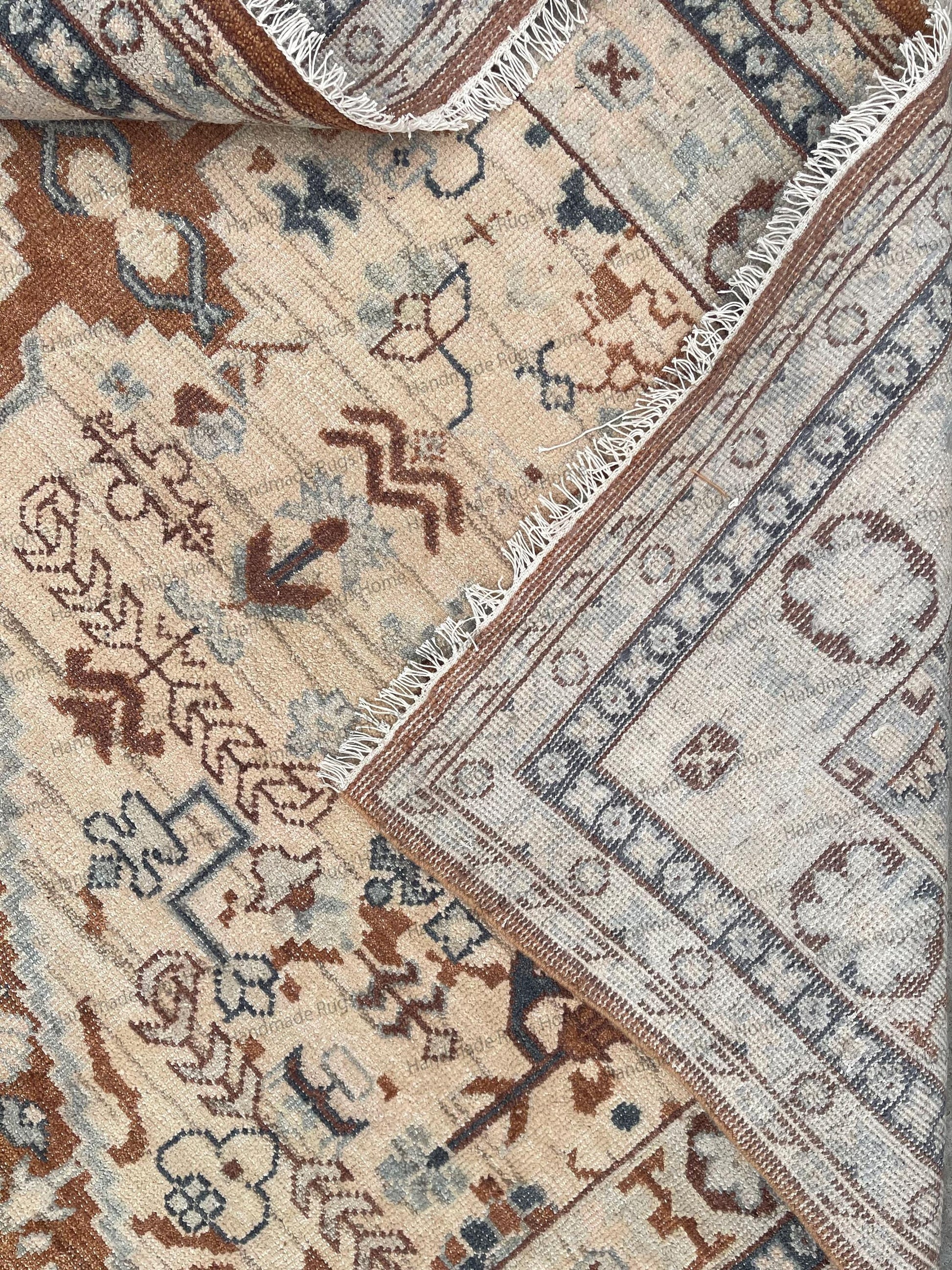 Close-up of premium hand-spun wool pile and artisan knotting detail.